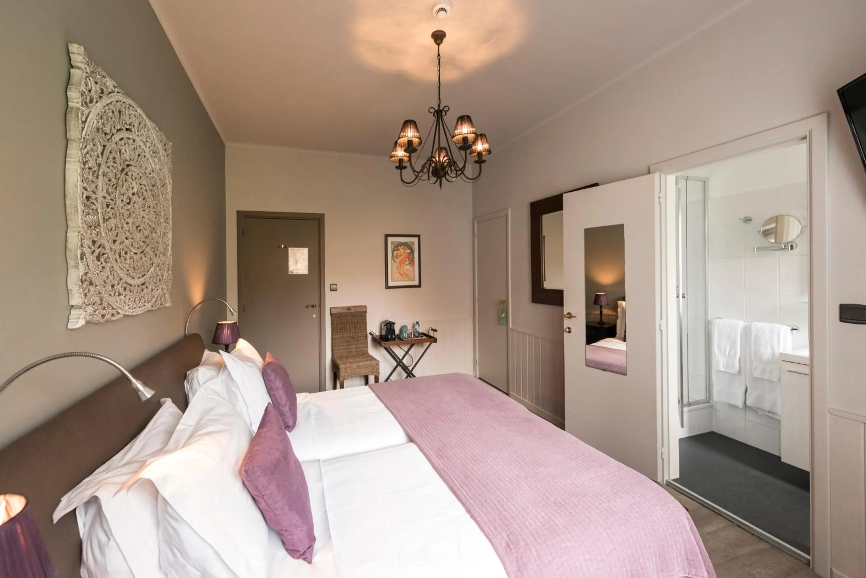 Bed in Charmehotel Klokkenhof