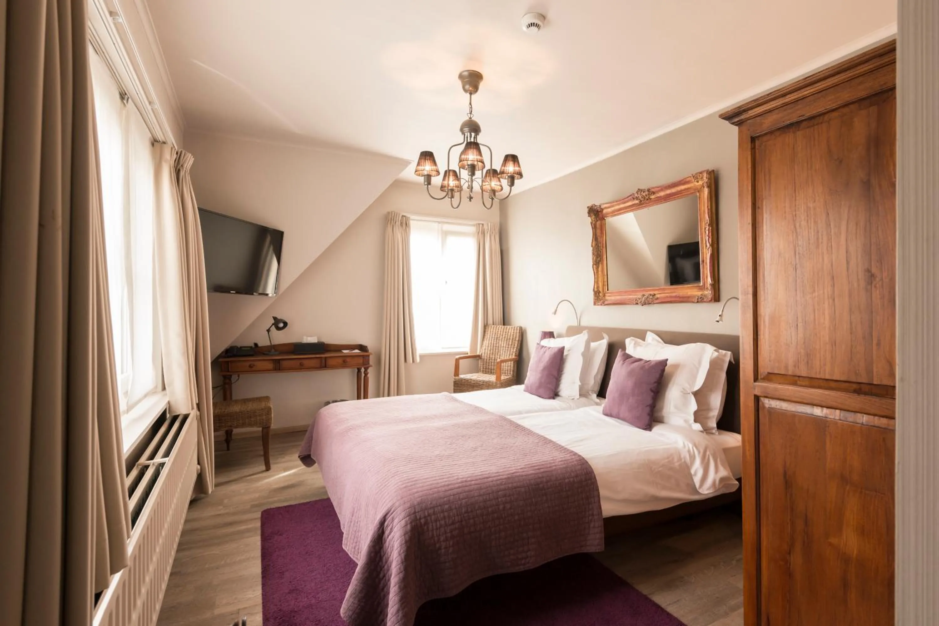 Bed in Charmehotel Klokkenhof