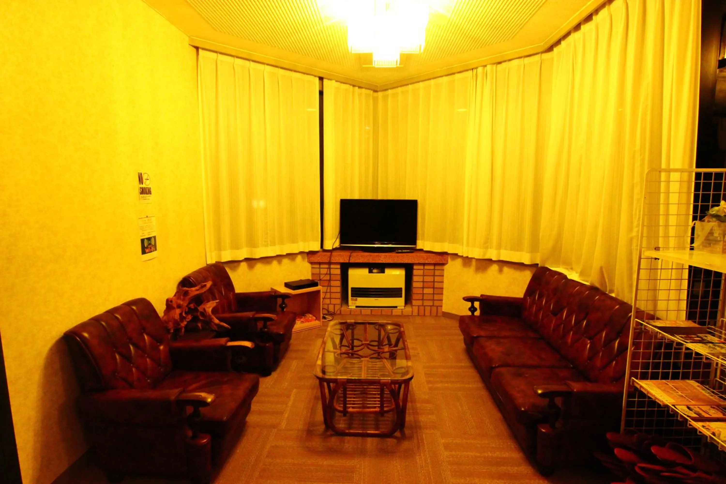 Communal lounge/ TV room in Hotel Utopia
