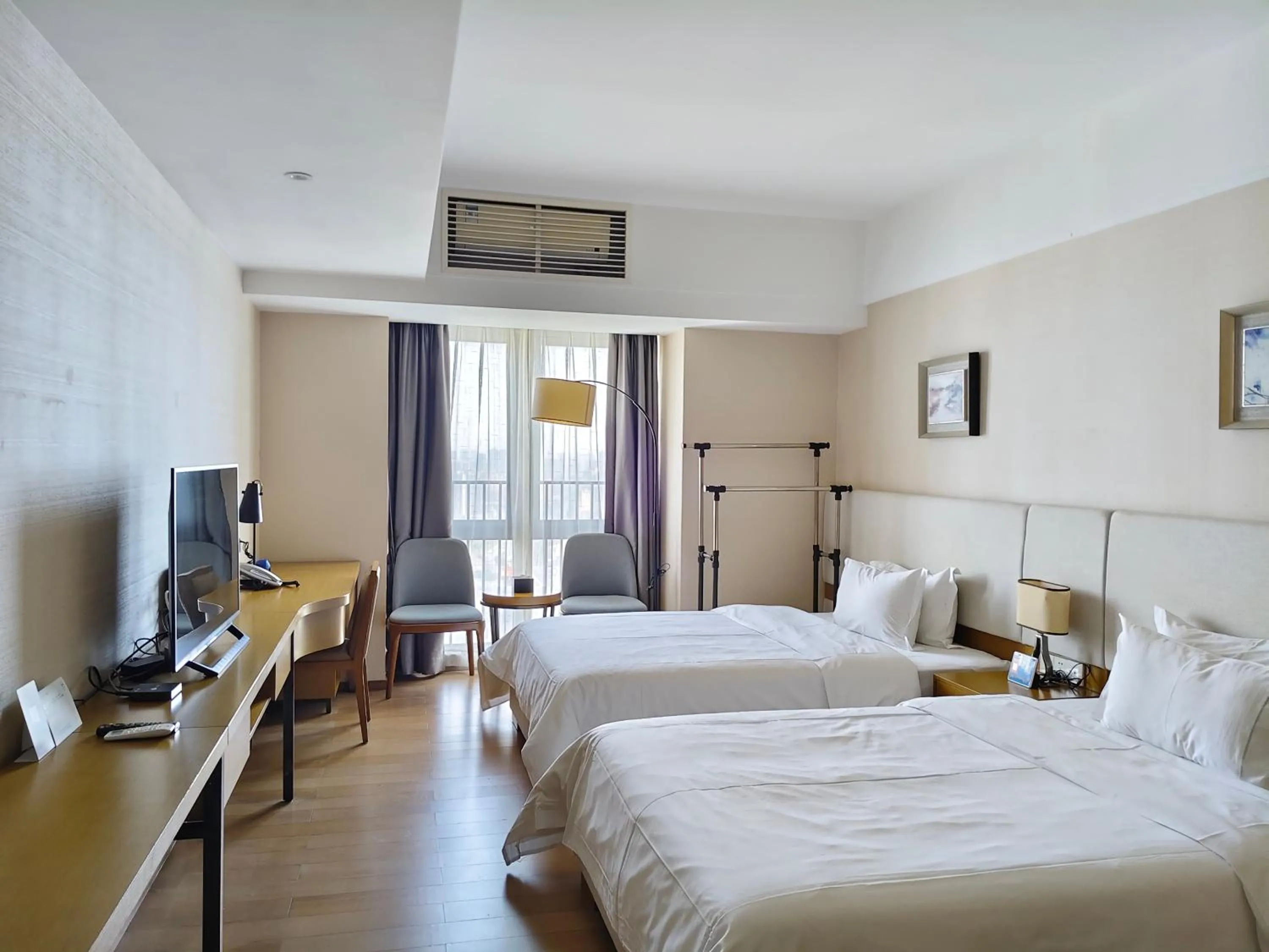 Bed in Yuwa Serviced Residence