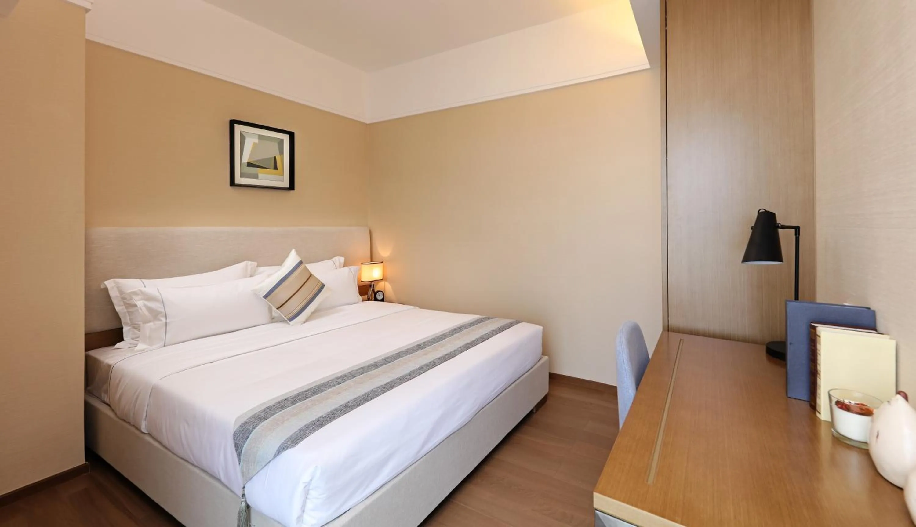 Bed in Yuwa Serviced Residence