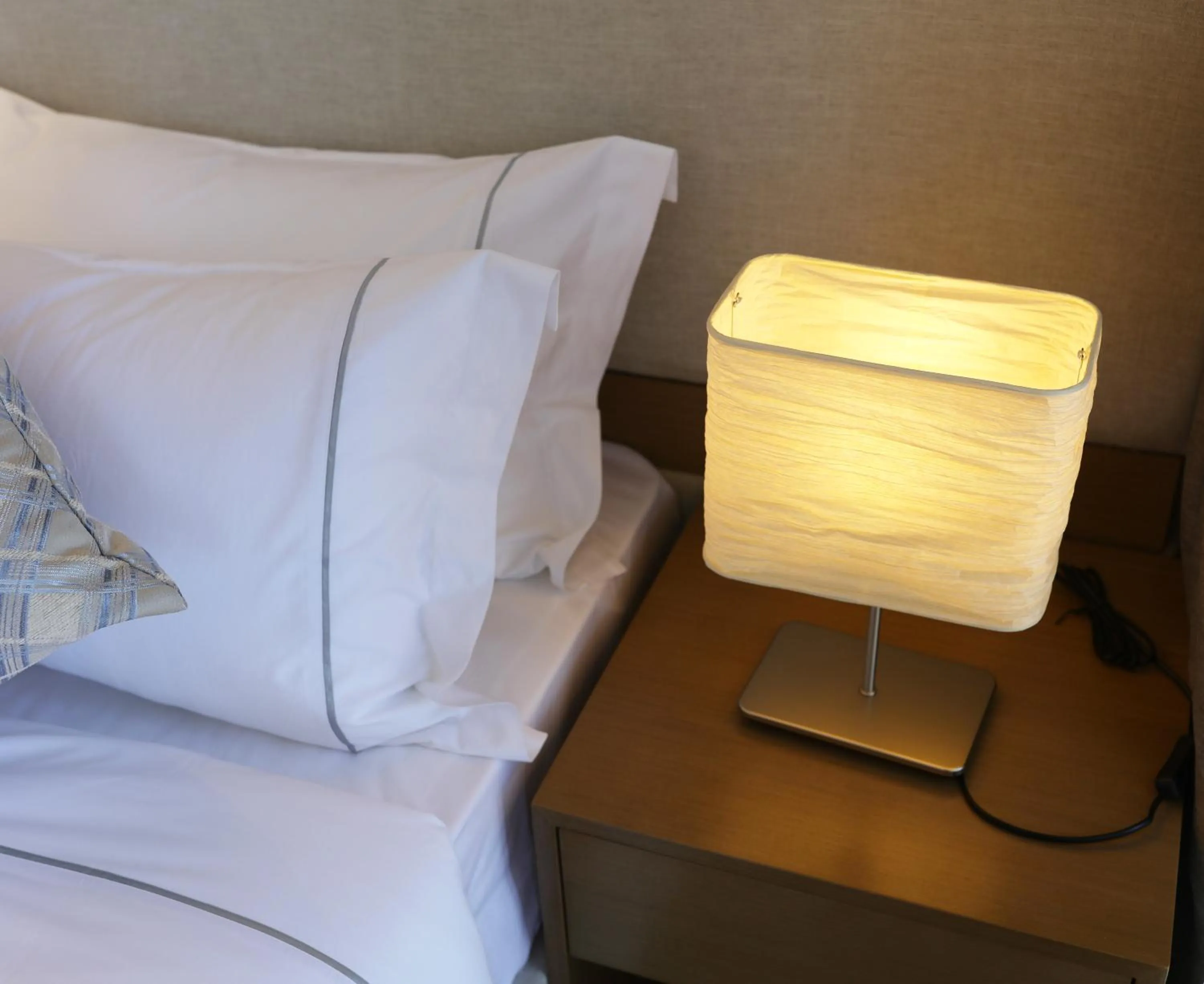 Bed in Yuwa Serviced Residence