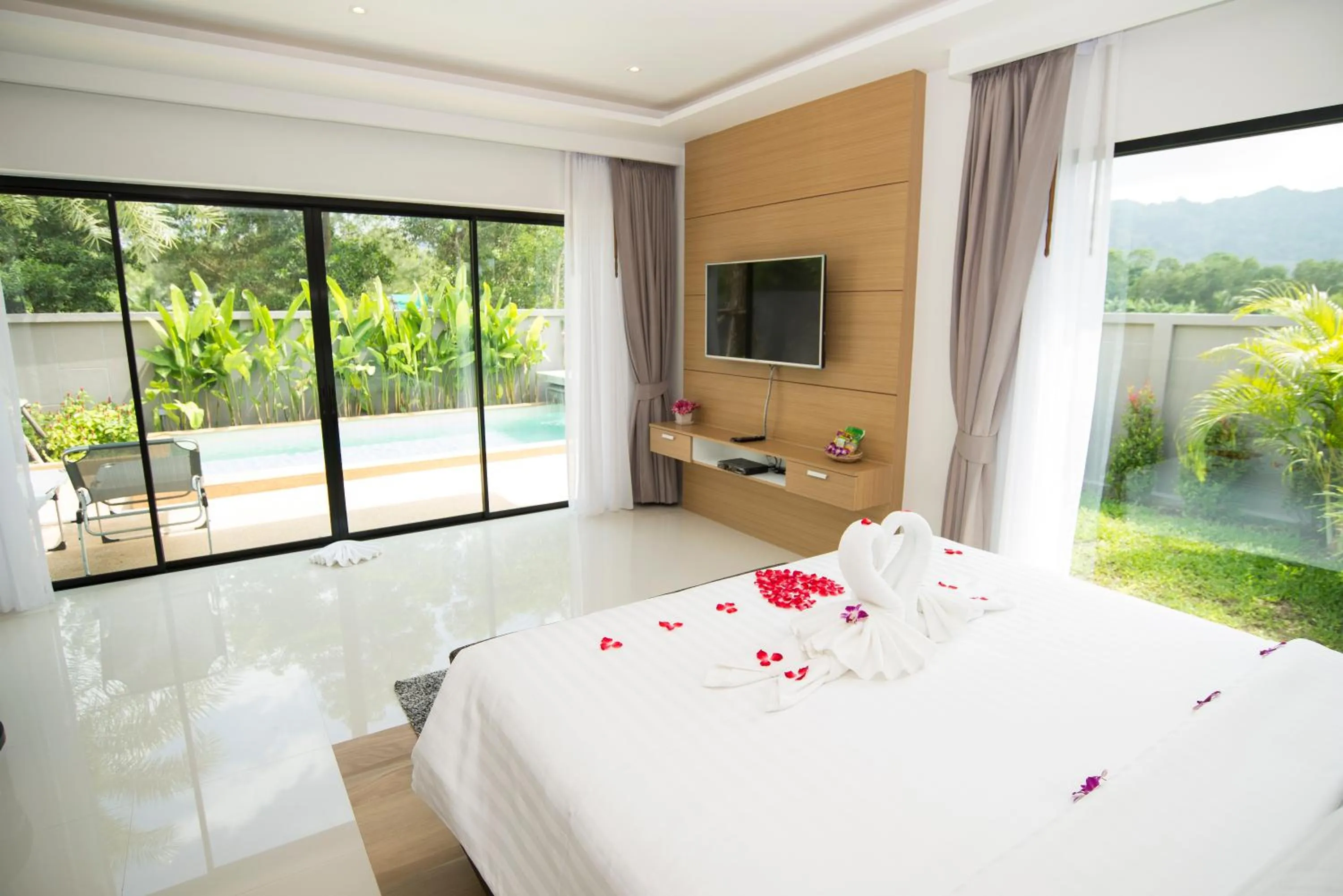 Bedroom, Bed in Pumeria Resort Phuket - SHA Plus