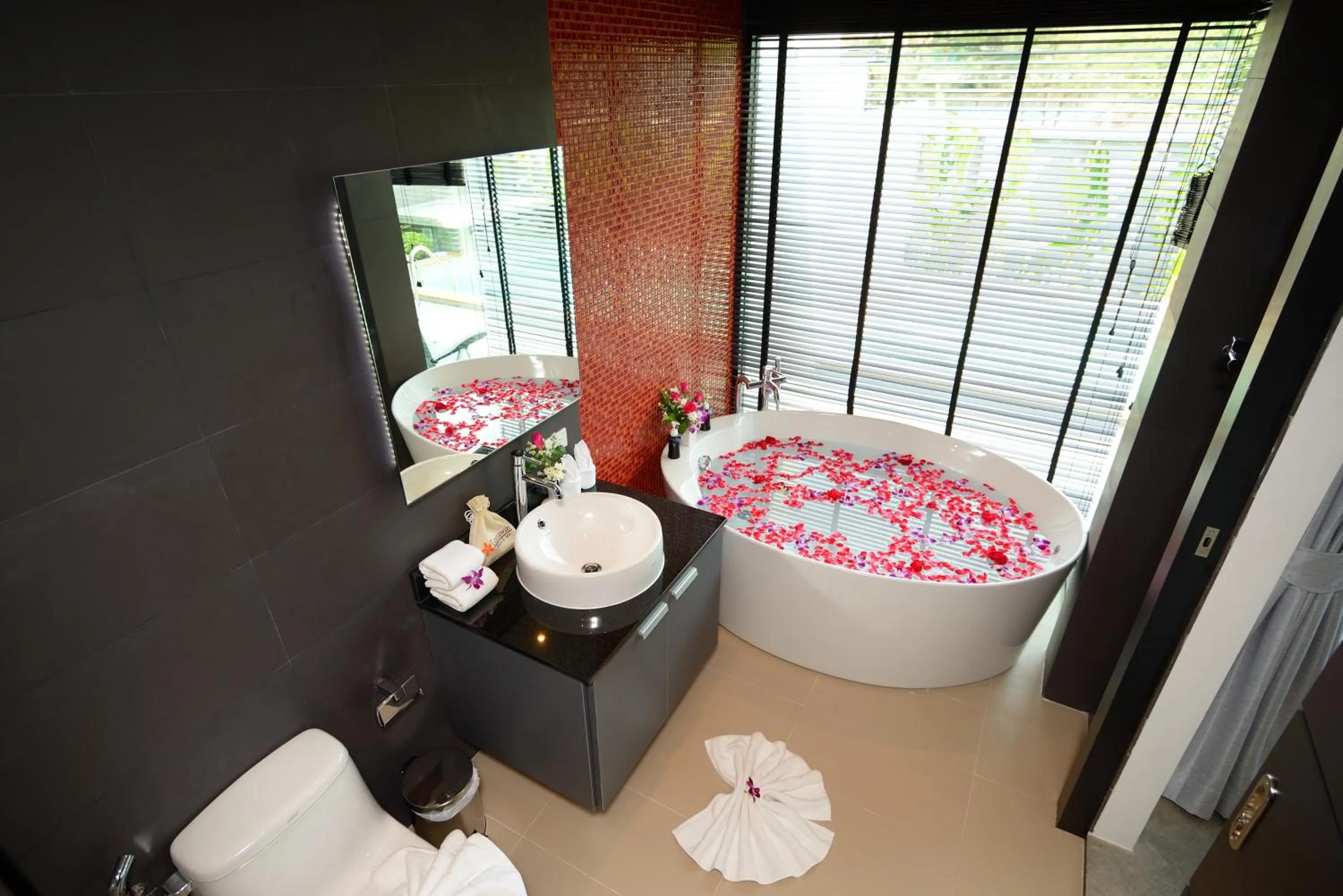 Bathroom in Pumeria Resort Phuket - SHA Plus