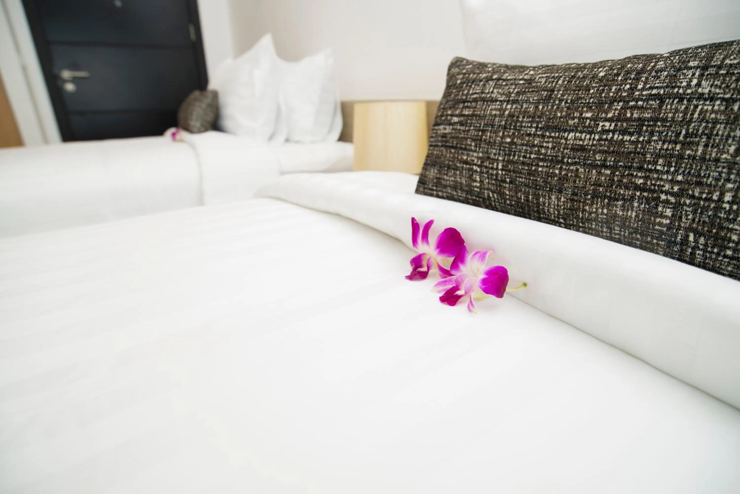Bed in Pumeria Resort Phuket - SHA Plus