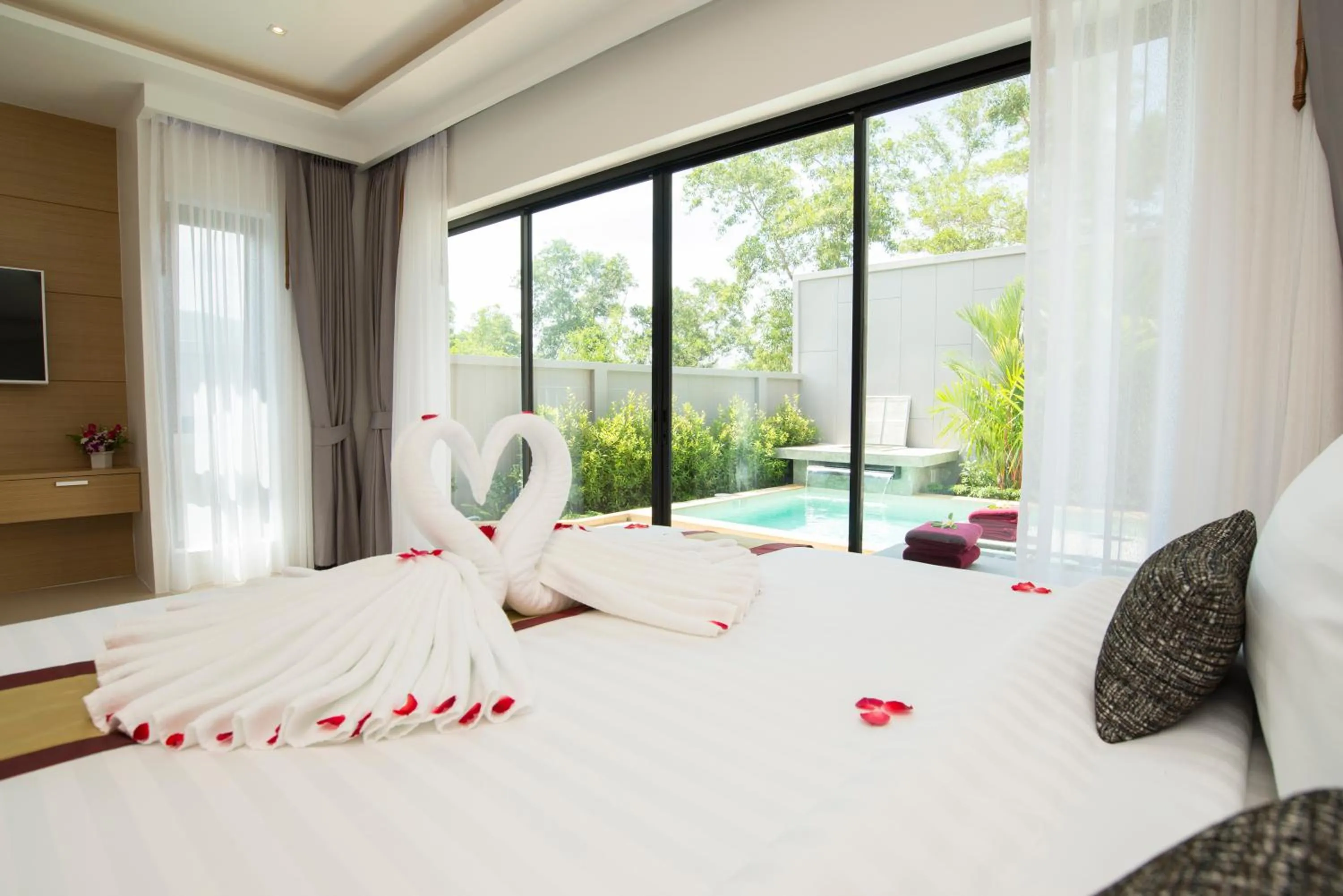 TV and multimedia, Bed in Pumeria Resort Phuket - SHA Plus
