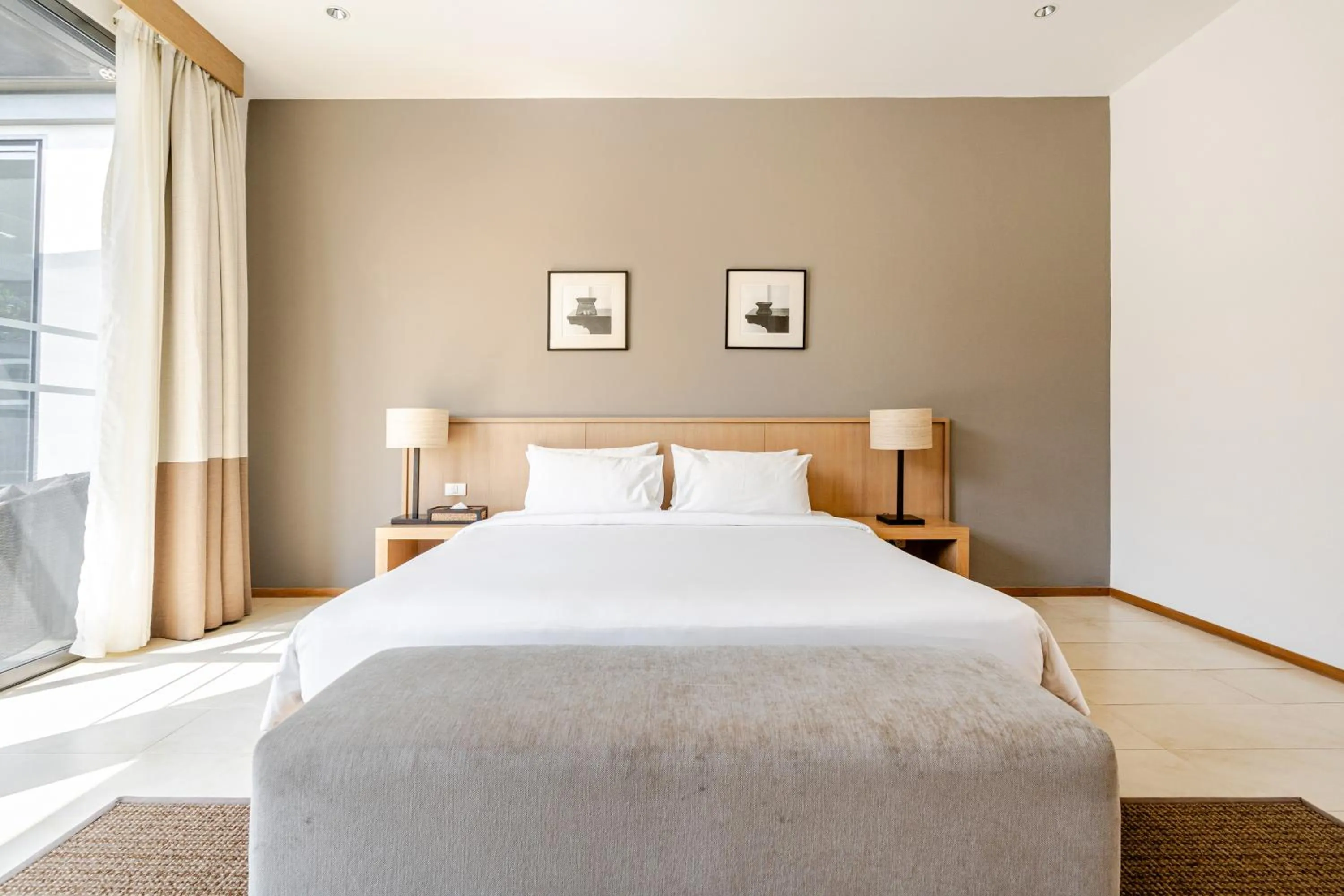 Bed in CASABAY Luxury Pool Villas by STAY