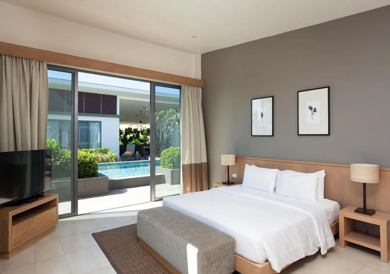 Bed in CASABAY Luxury Pool Villas by STAY