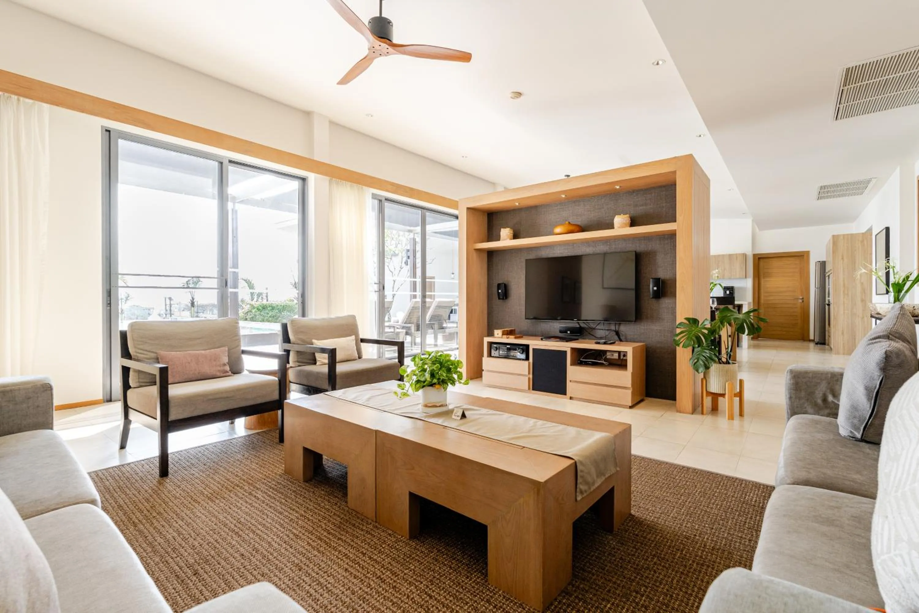 Living room in CASABAY Luxury Pool Villas by STAY