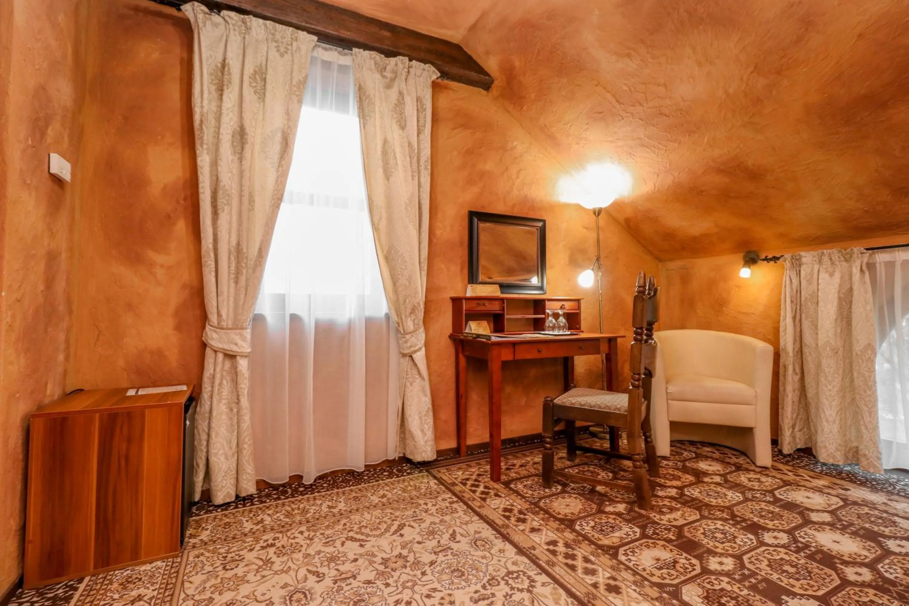 Photo of the whole room in Puchner Kastélyszálló