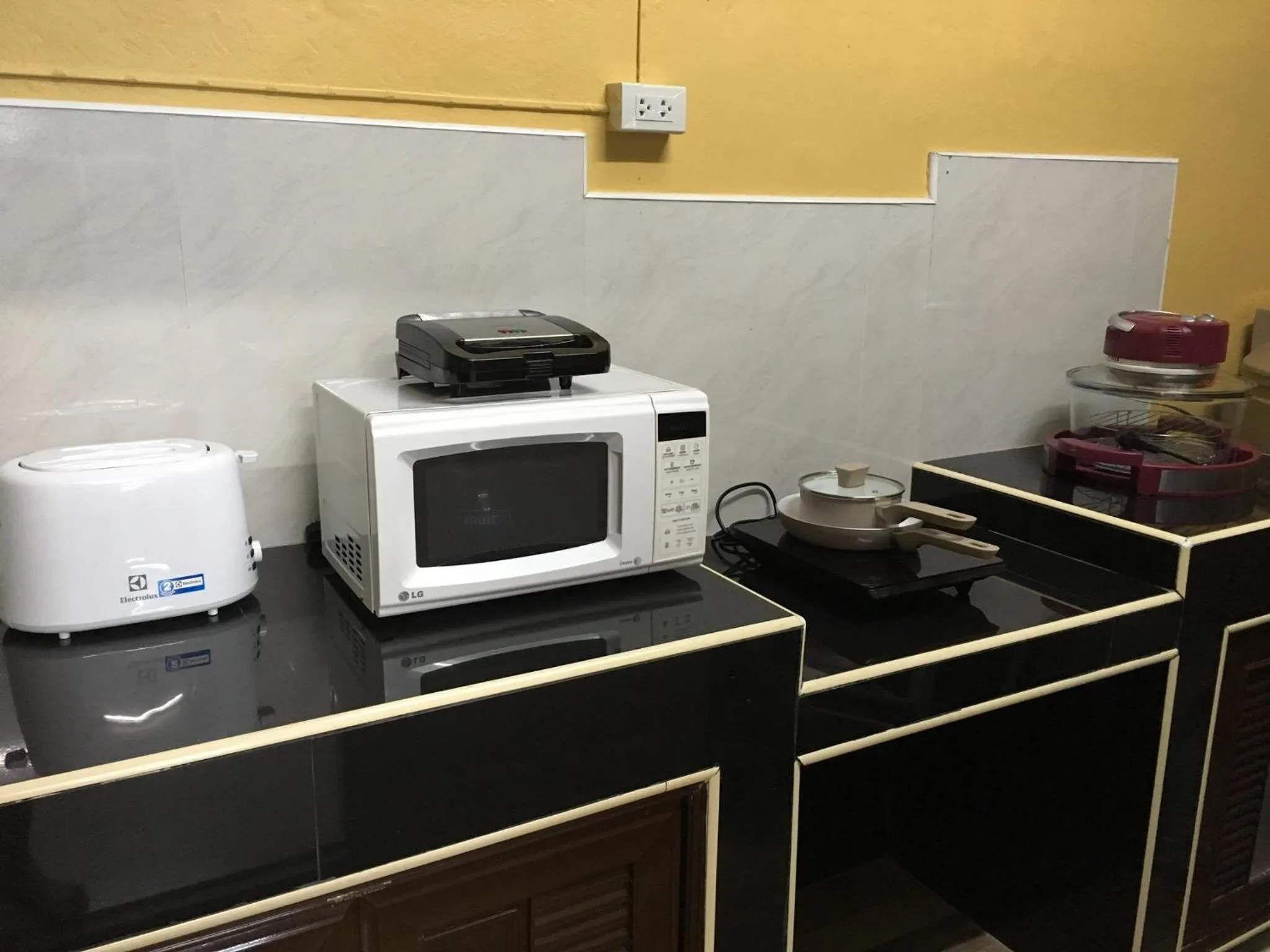 Communal kitchen in DKaYa Hostel