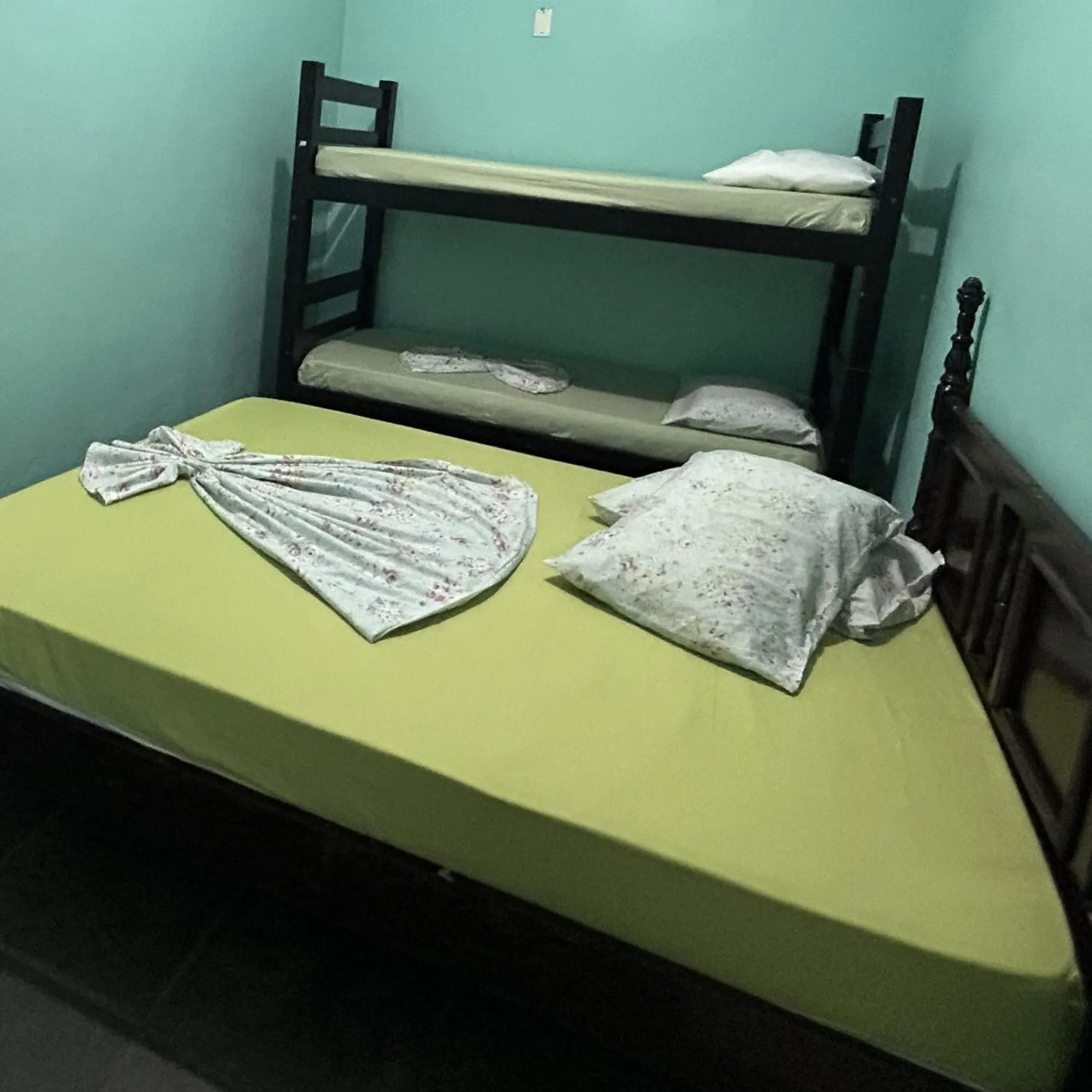 Bed in Pousada Orquidário