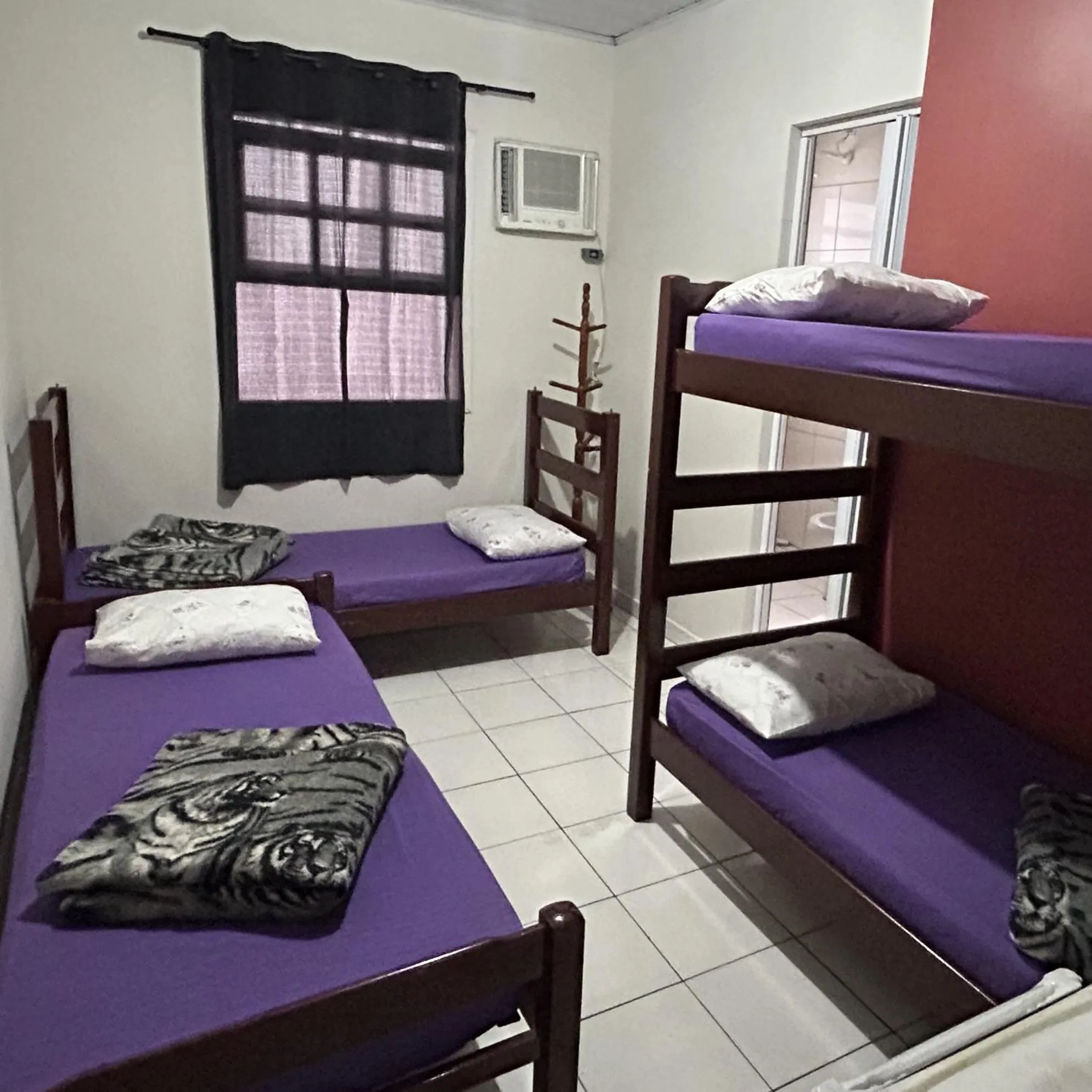 Bed in Pousada Orquidário