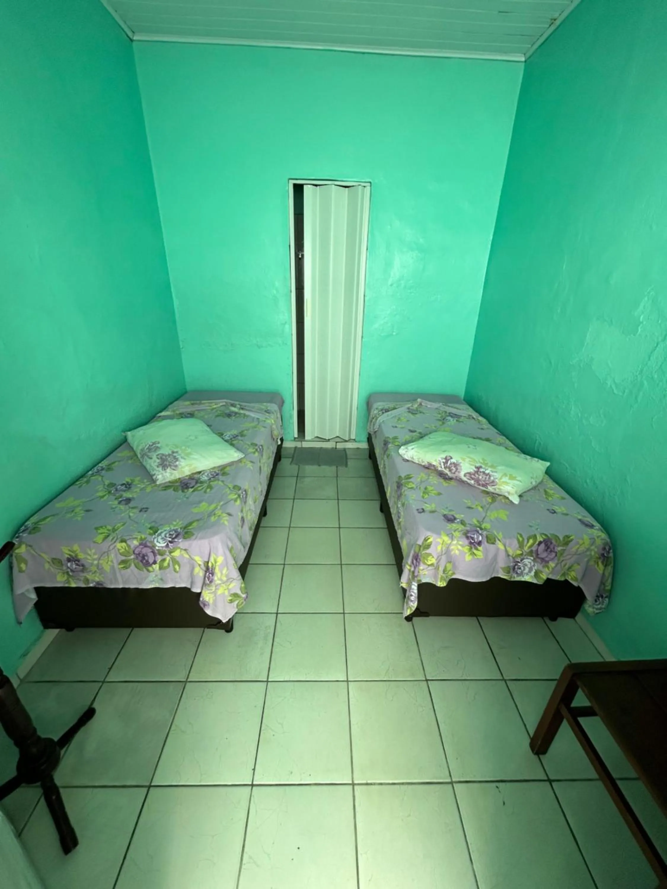 Bed in Pousada Orquidário