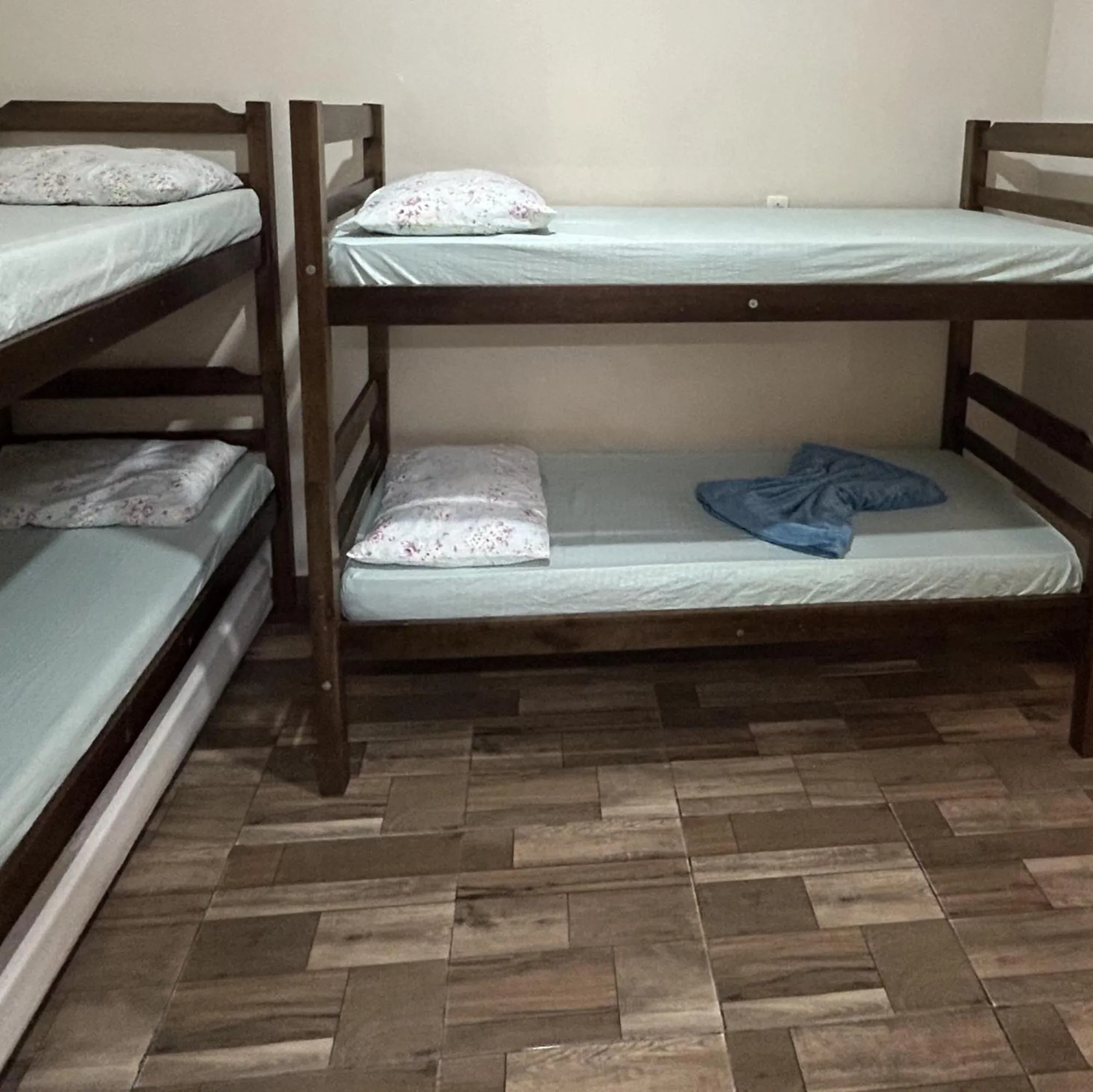 Bed in Pousada Orquidário