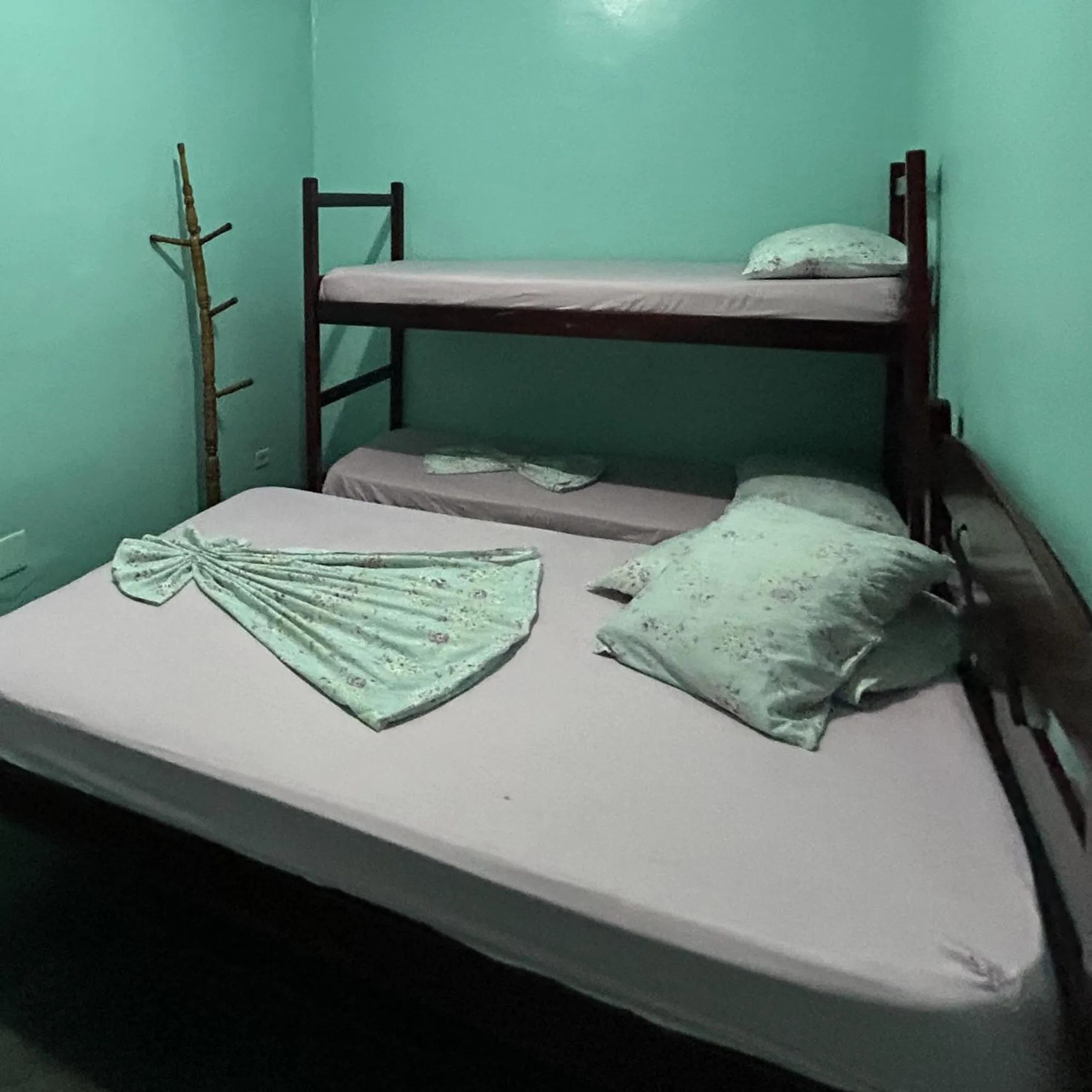 Bed in Pousada Orquidário