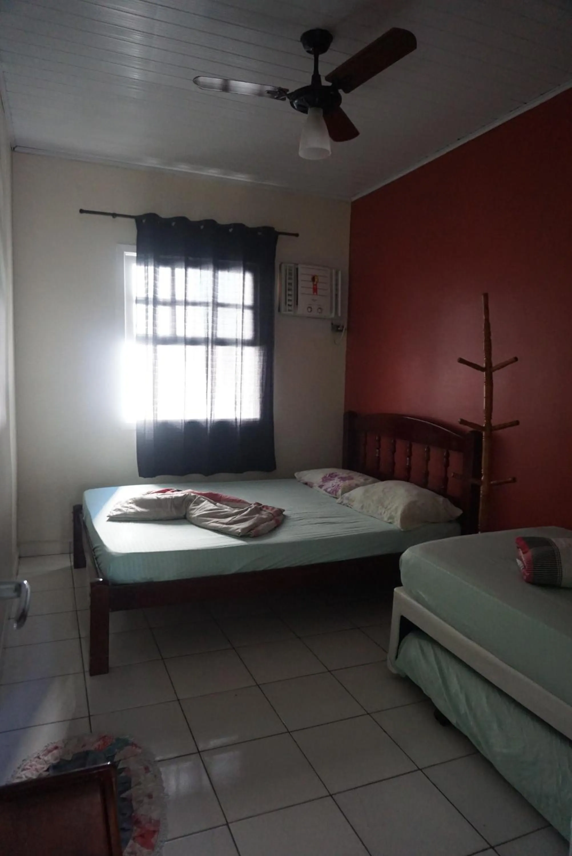 Bed in Pousada Orquidário