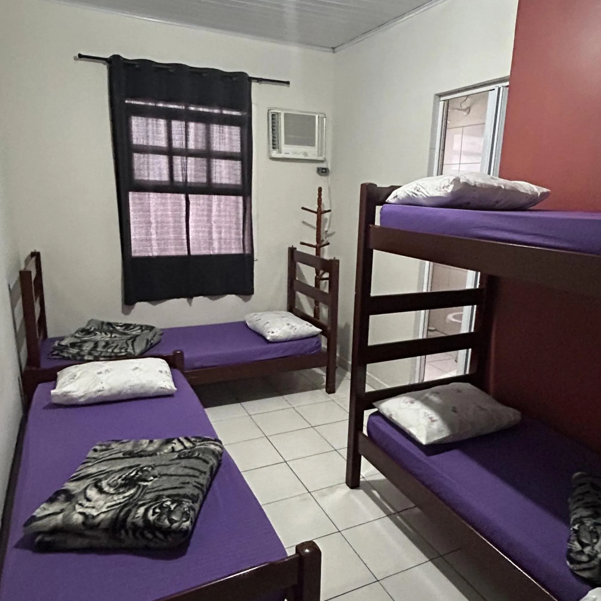 Bed in Pousada Orquidário