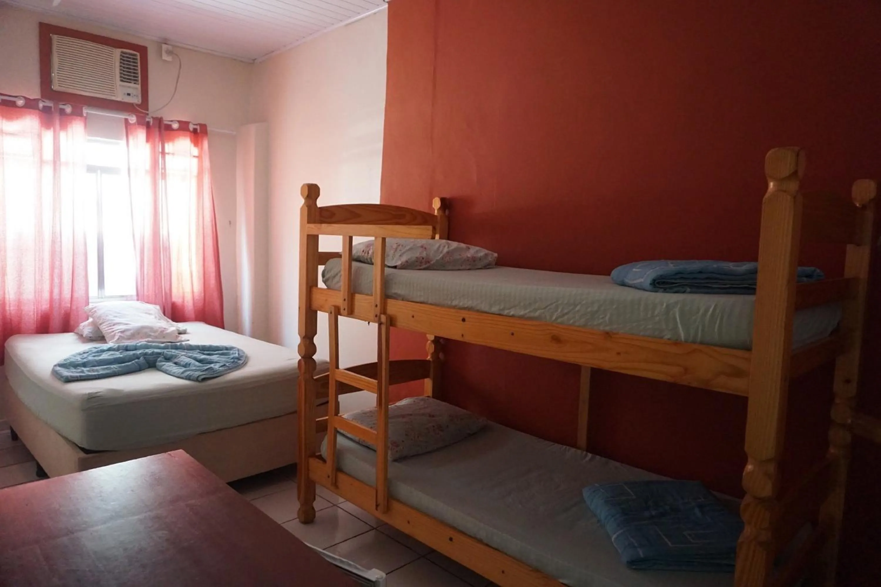 Bed in Pousada Orquidário