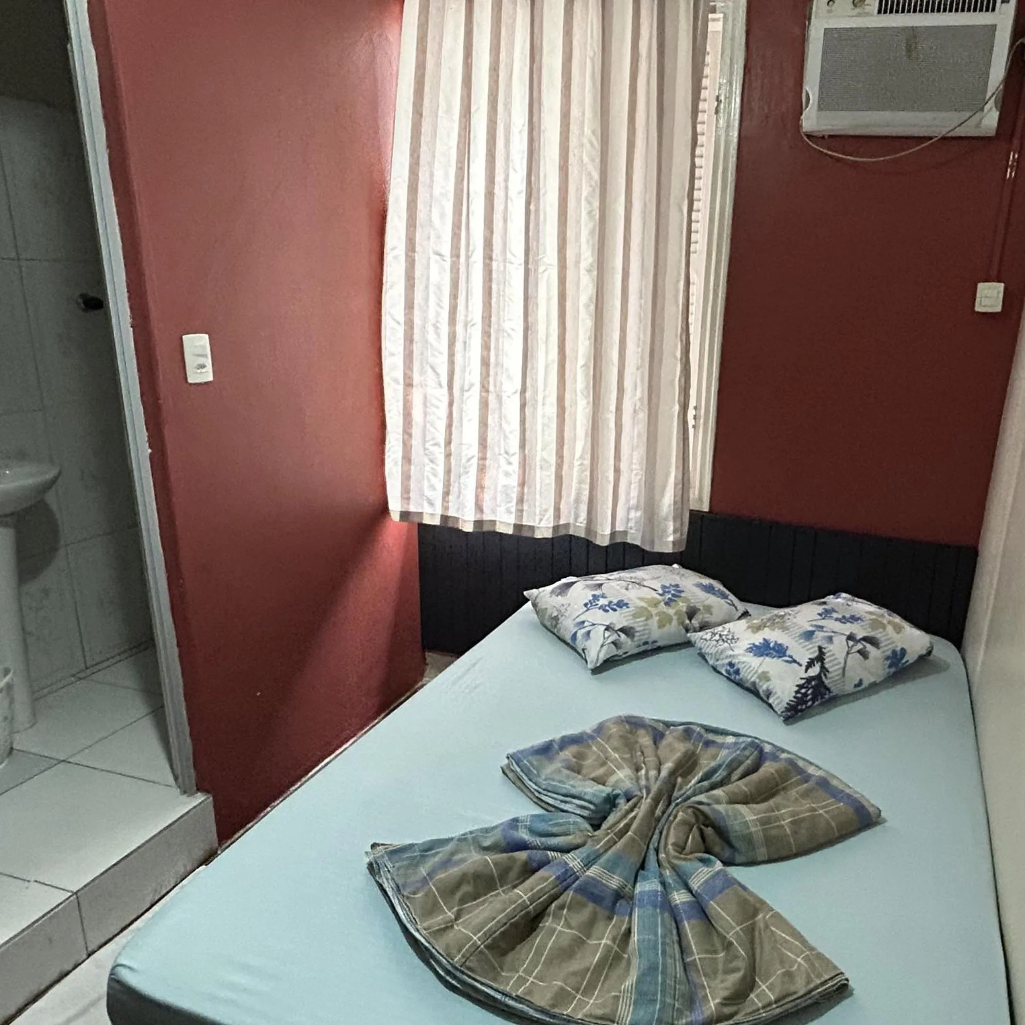 Bed in Pousada Orquidário