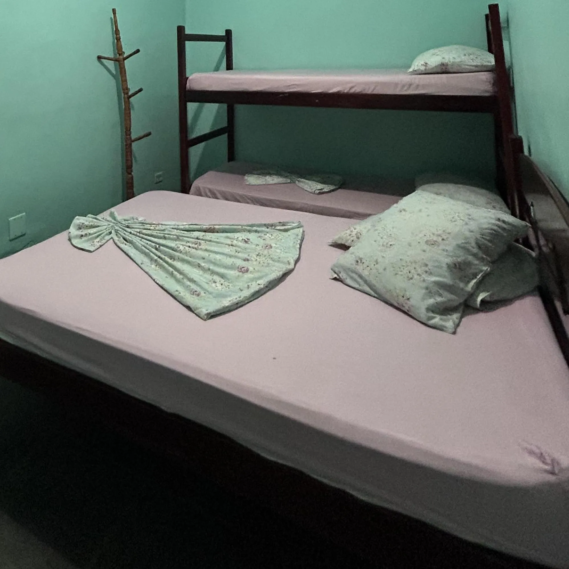 Bed in Pousada Orquidário