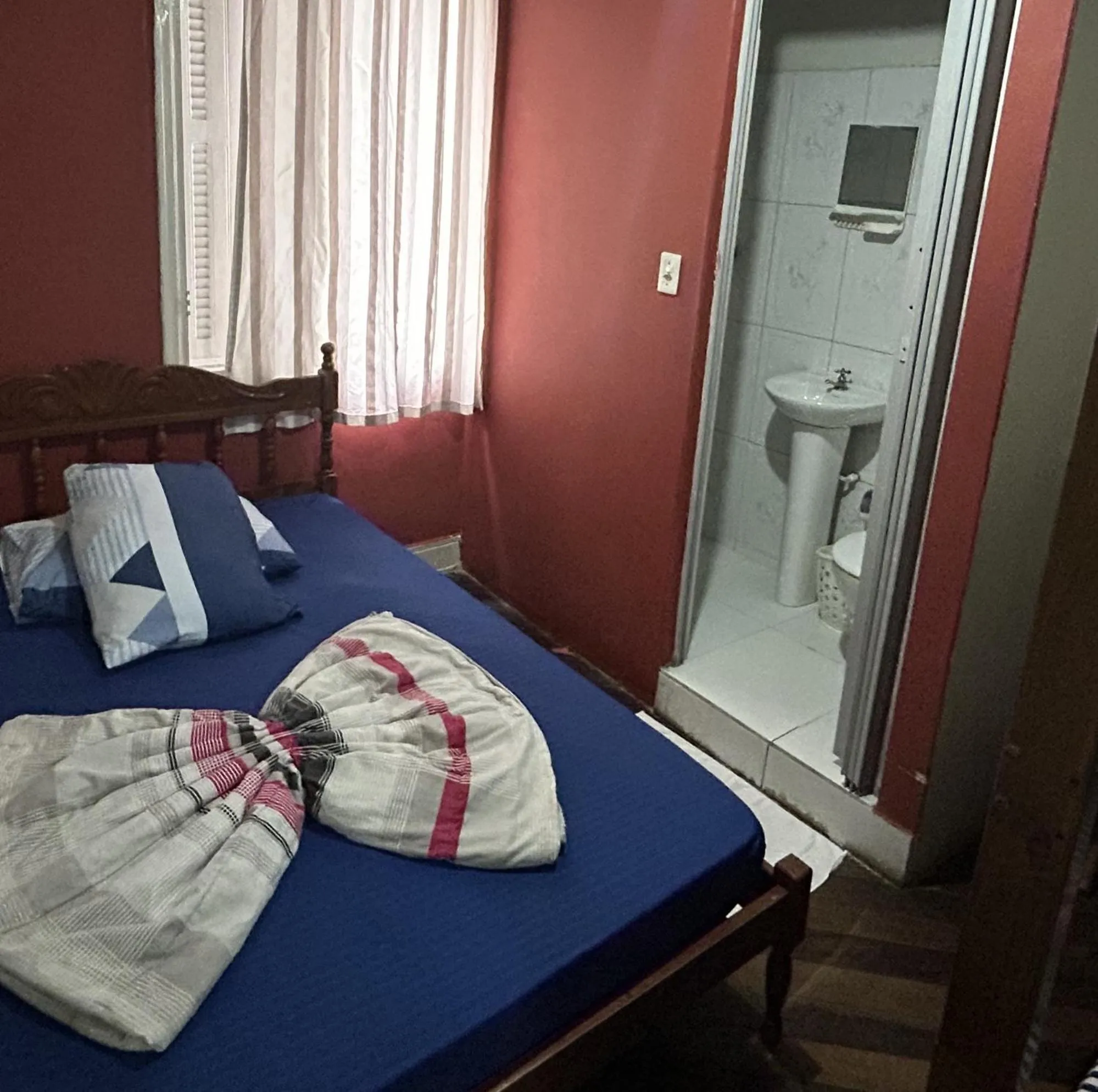 Bed in Pousada Orquidário