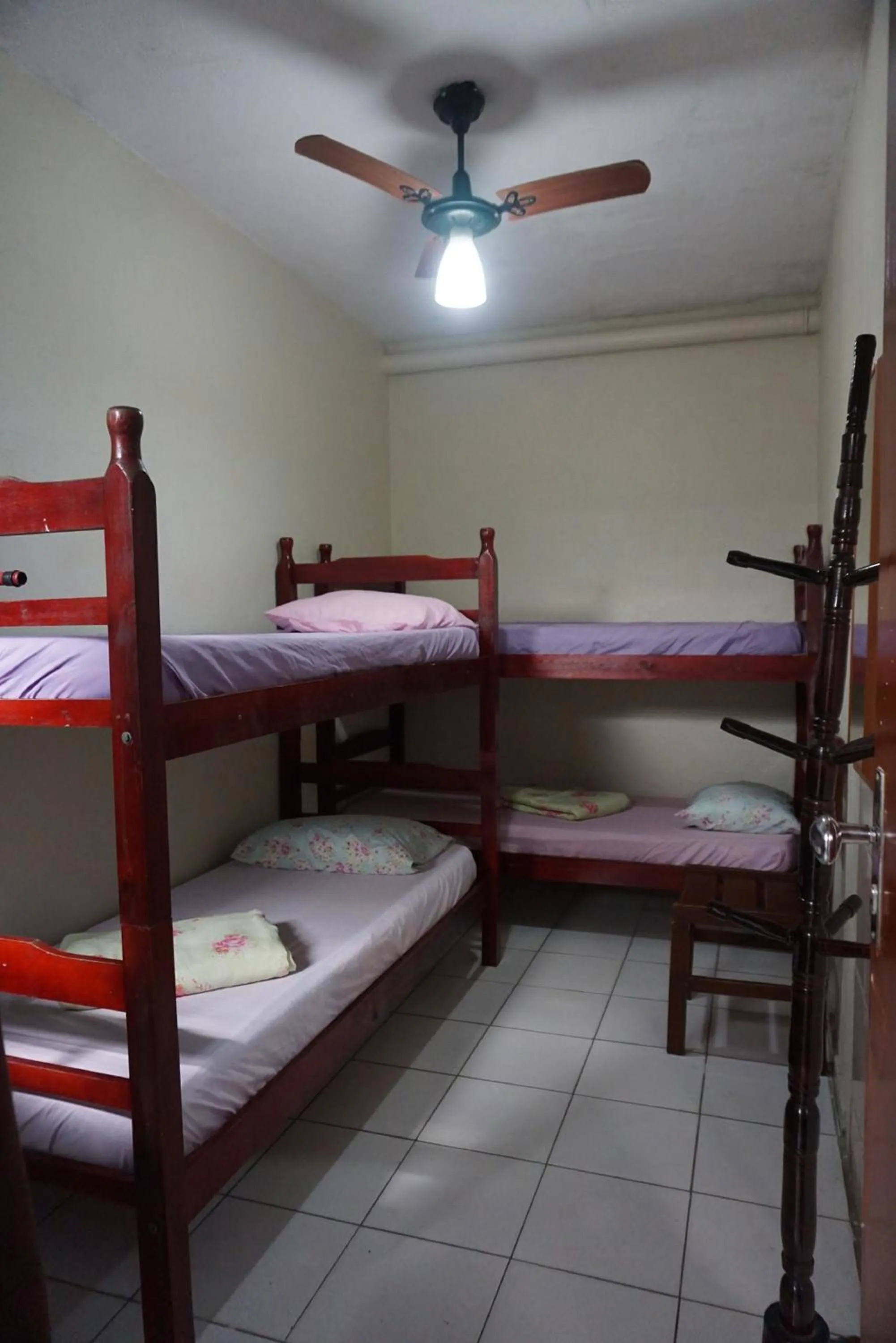 Bed in Pousada Orquidário