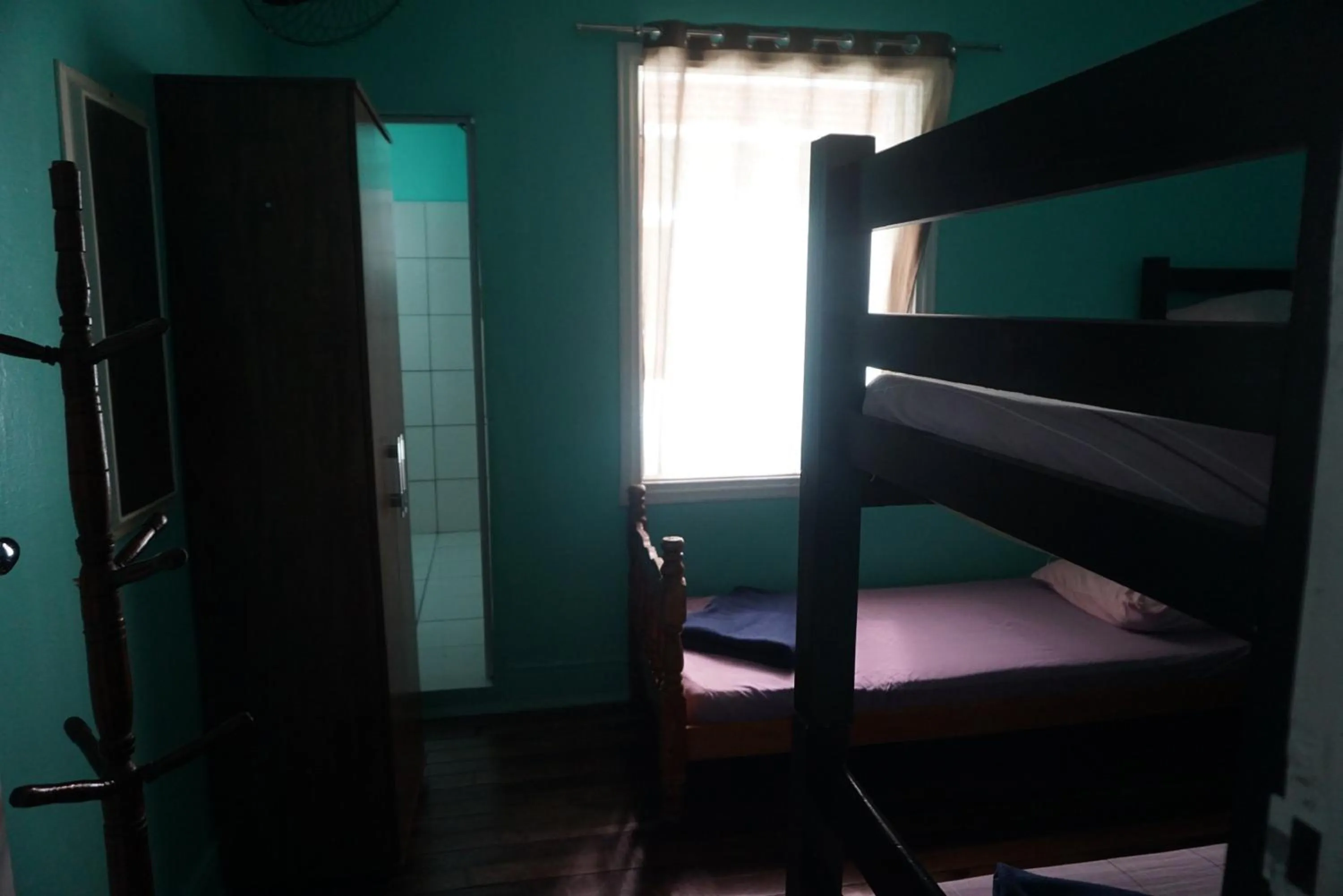 Bed in Pousada Orquidário