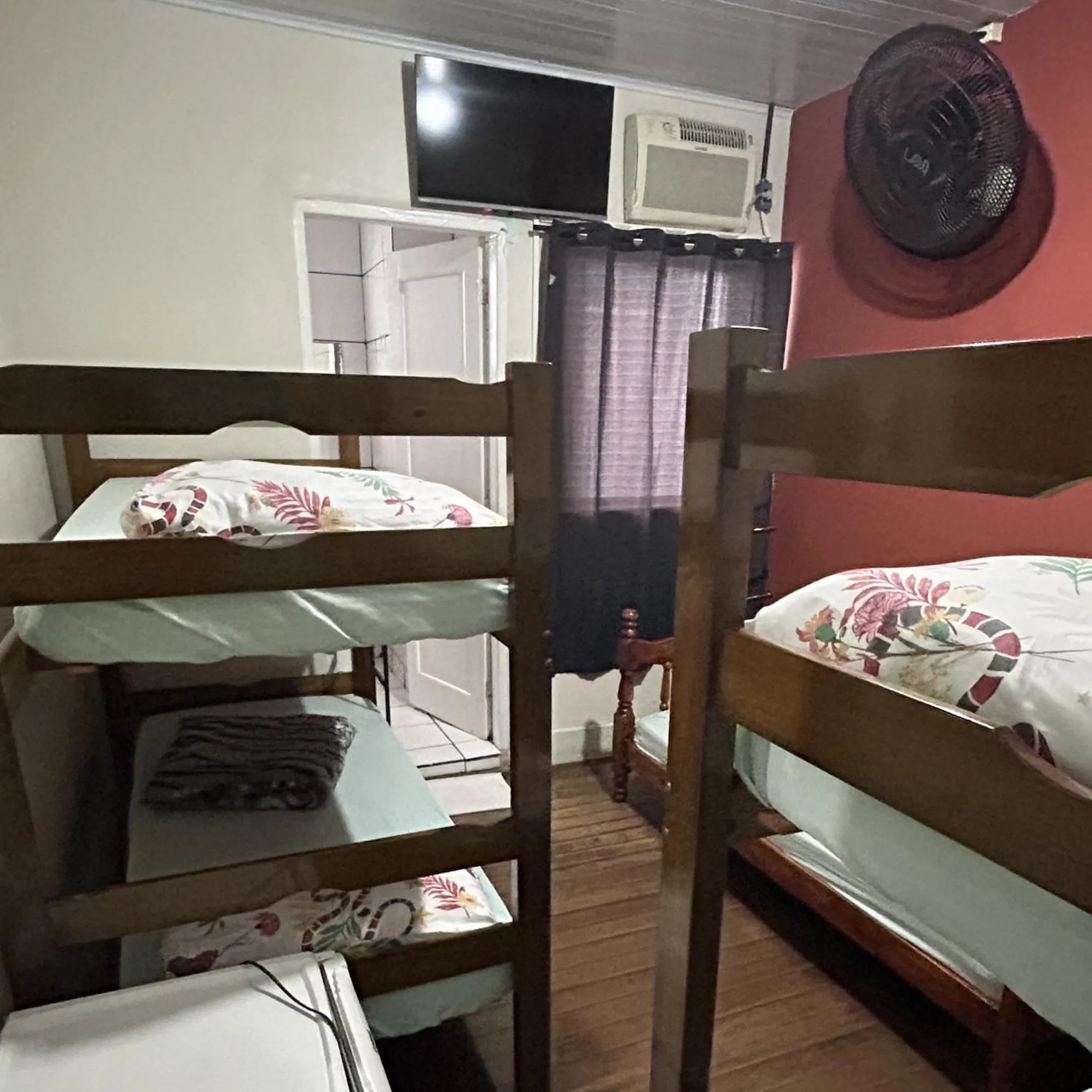 Bed in Pousada Orquidário