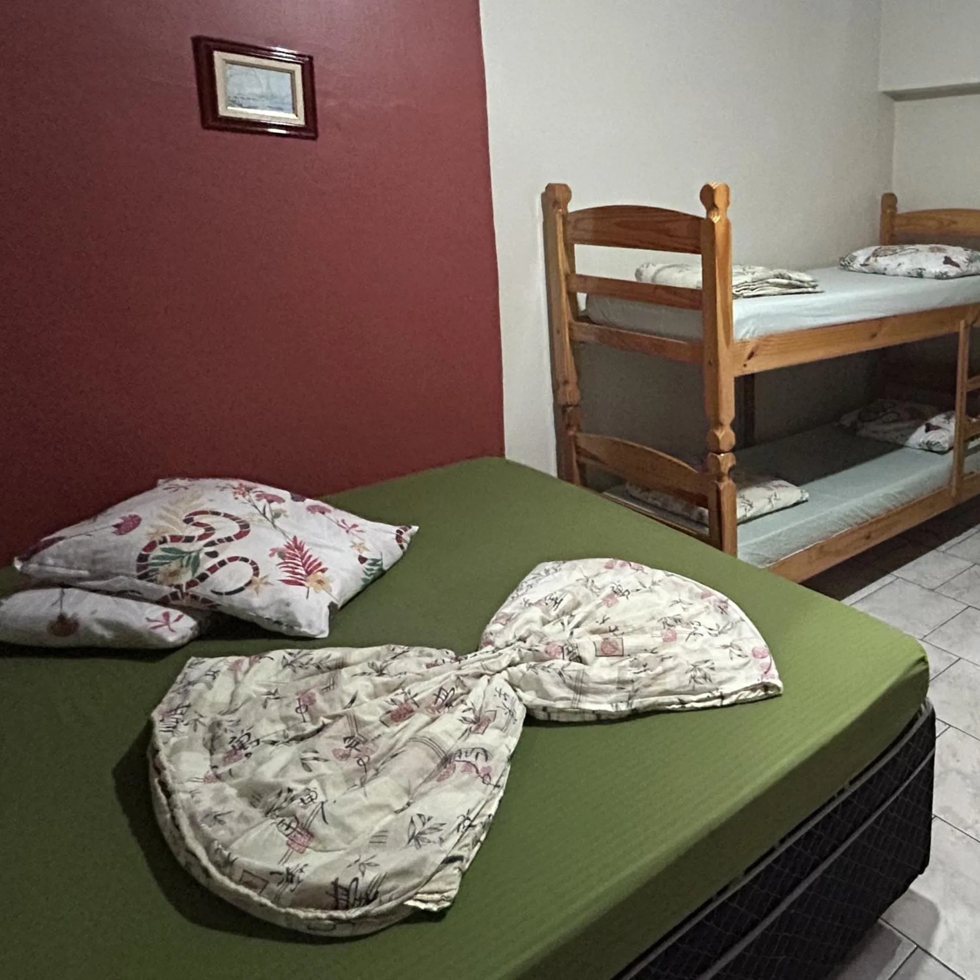 Bed in Pousada Orquidário