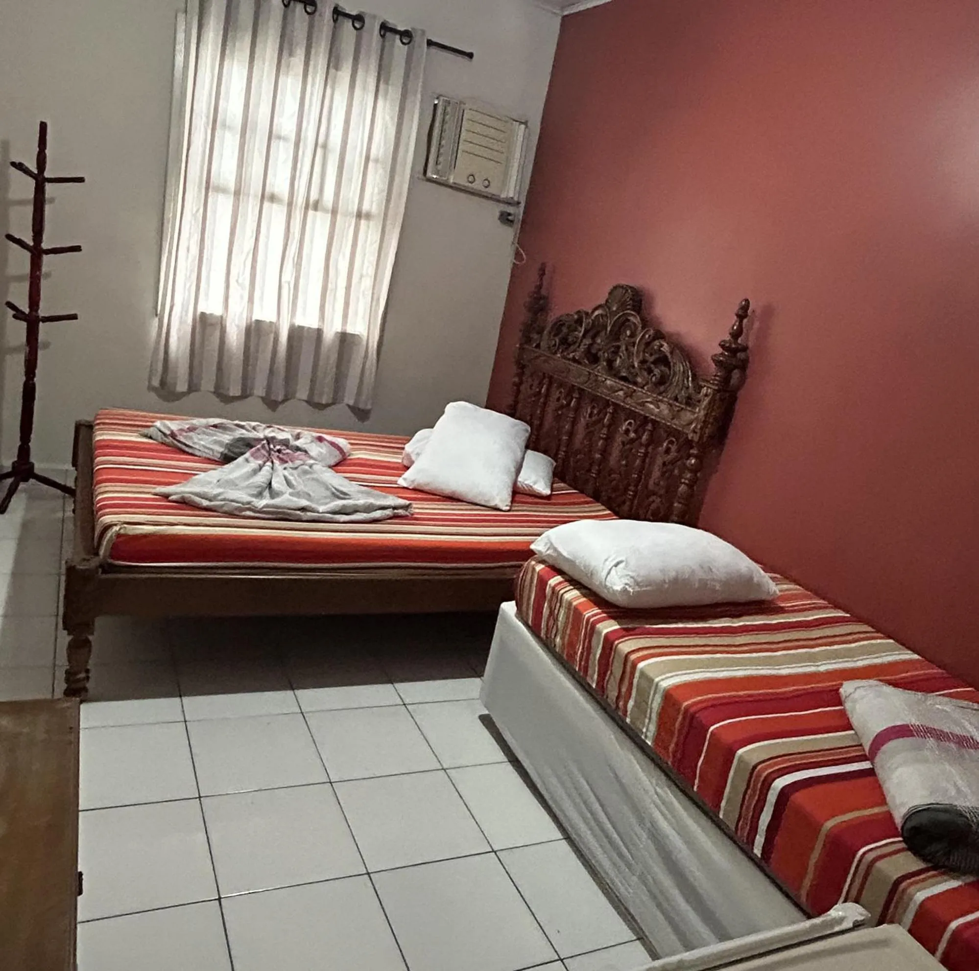 Bed in Pousada Orquidário