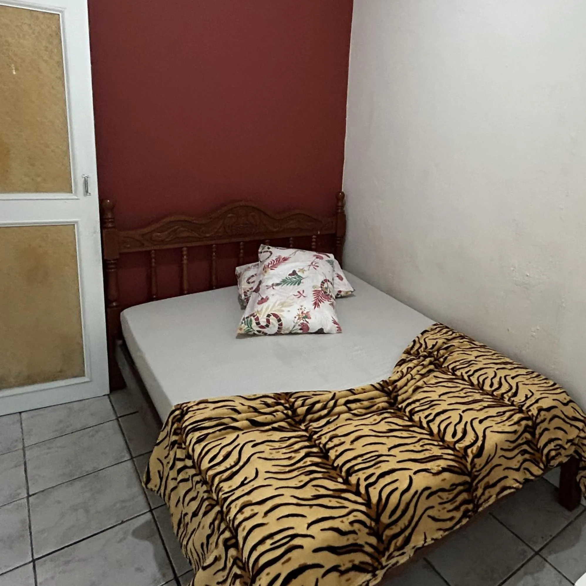 Bed in Pousada Orquidário