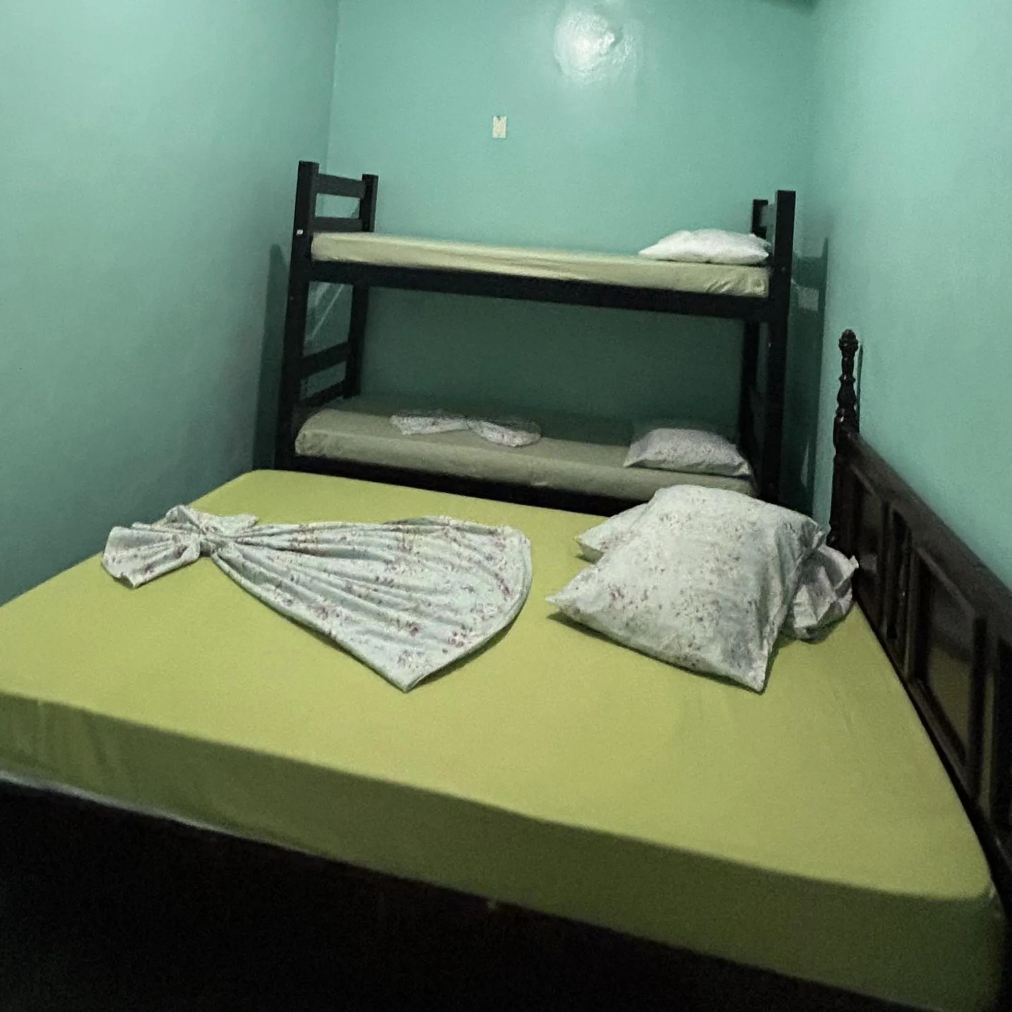 Bed in Pousada Orquidário