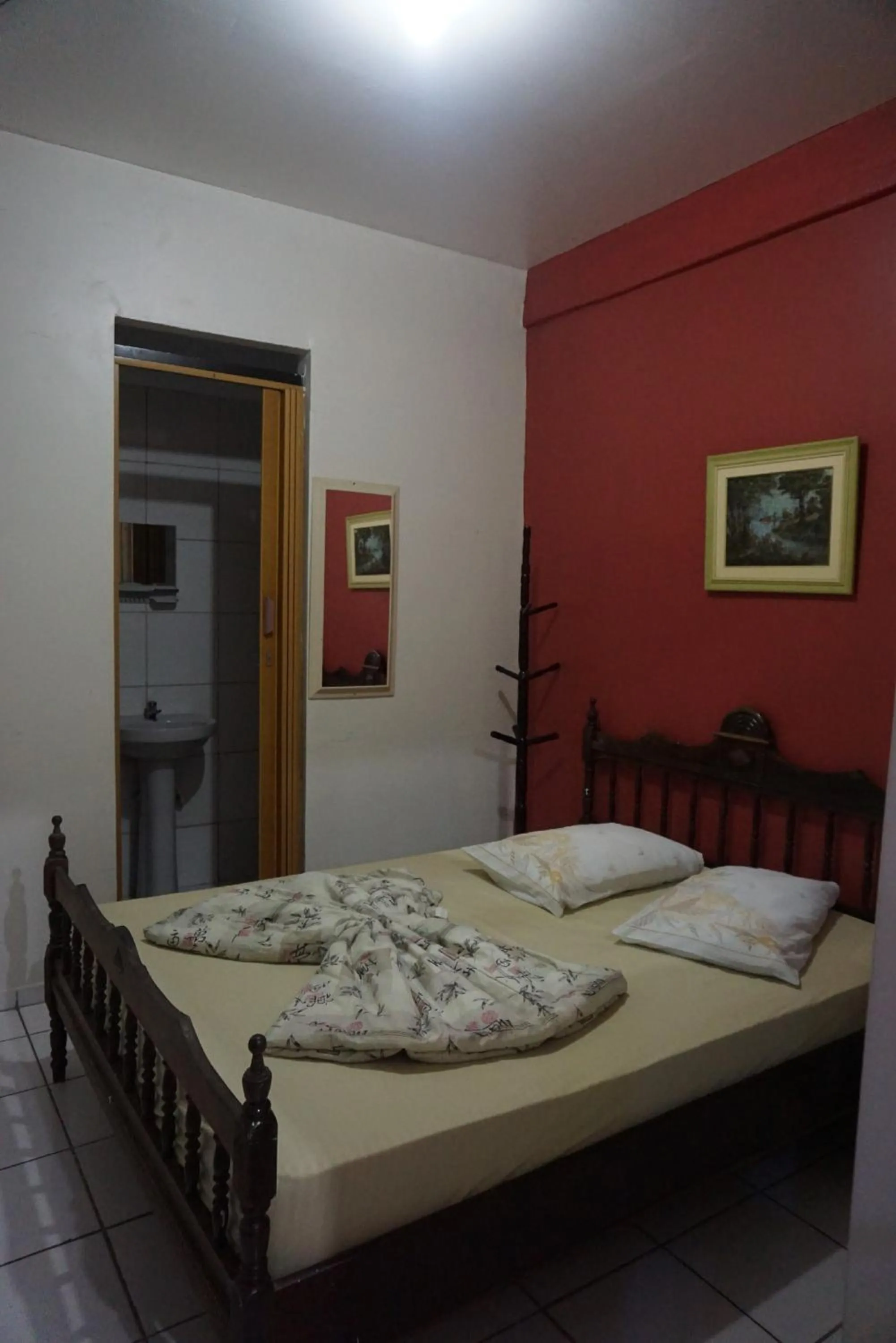 Bed in Pousada Orquidário