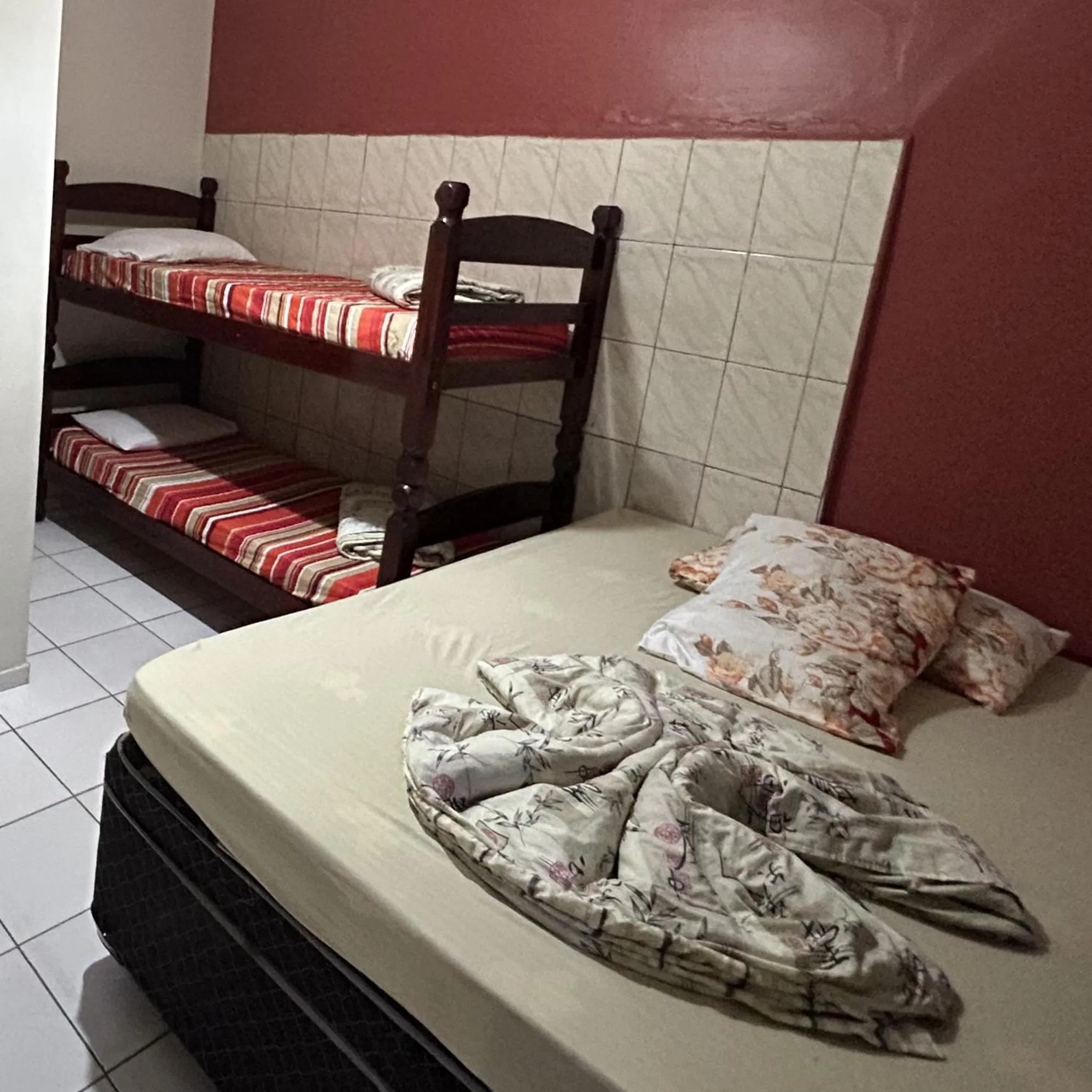 Bed in Pousada Orquidário