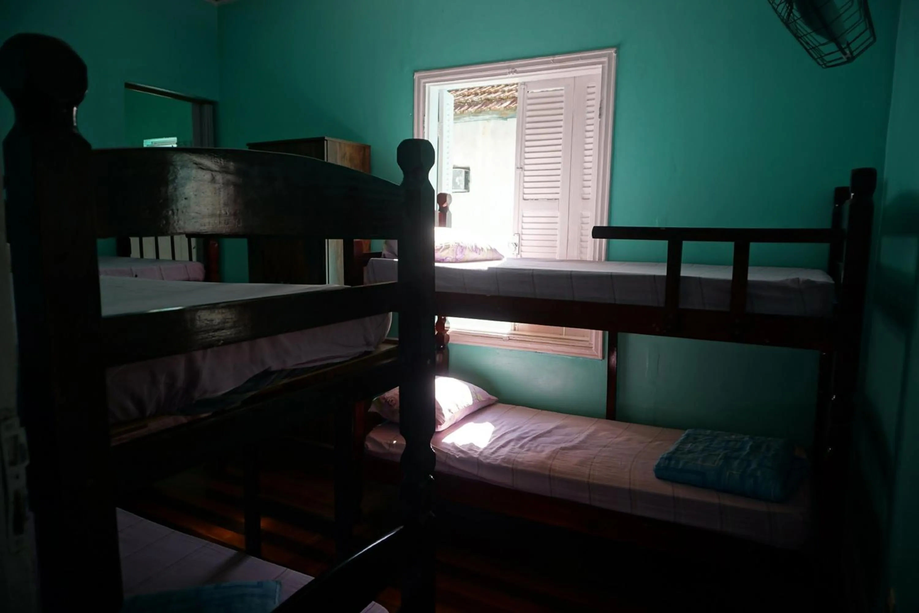 Bed in Pousada Orquidário