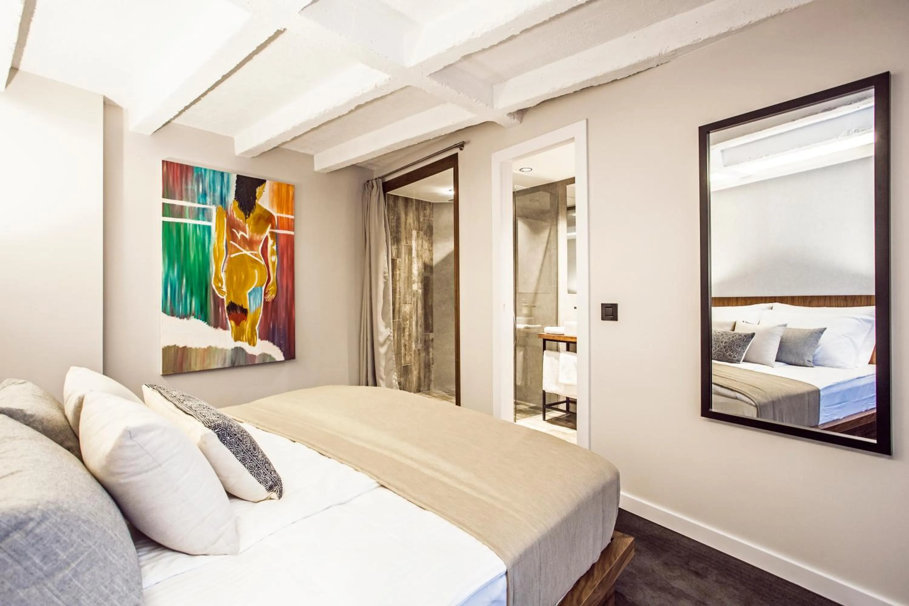 Shower, Bed in Nomad Luxury Suites