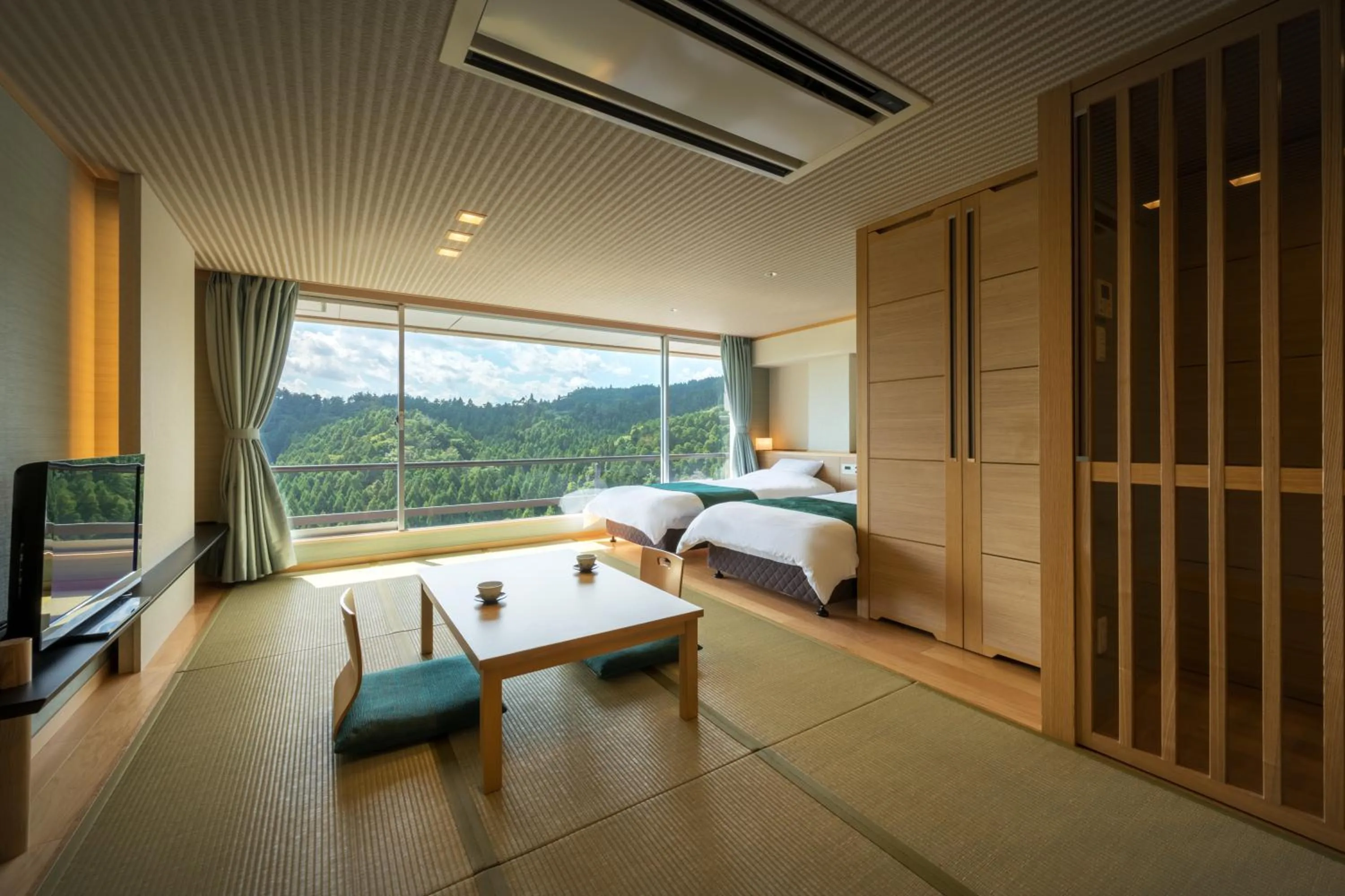 Bed in Hotel Matsushima Taikanso