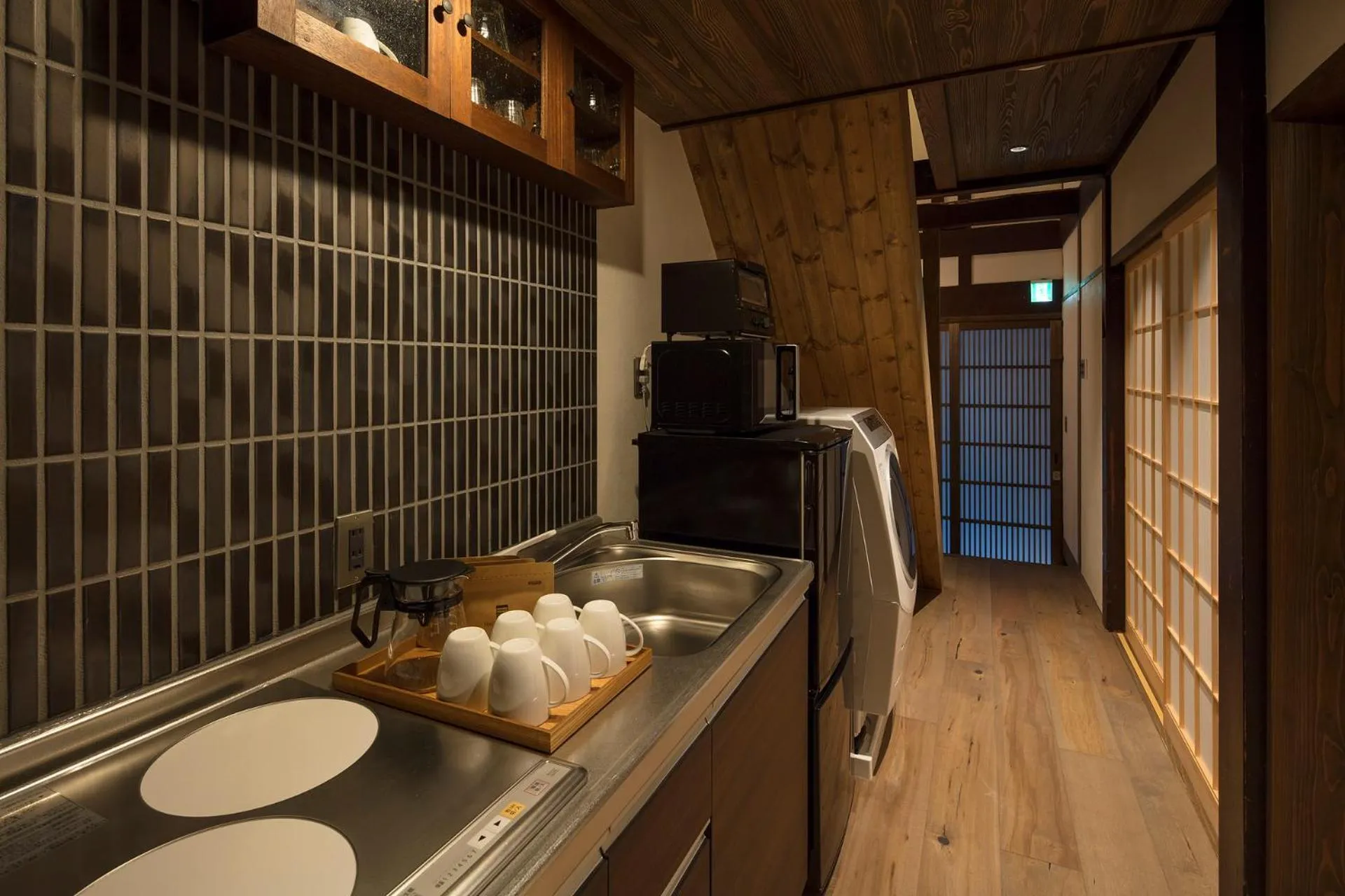 Kitchen or kitchenette in Sumitsugu Machiya House