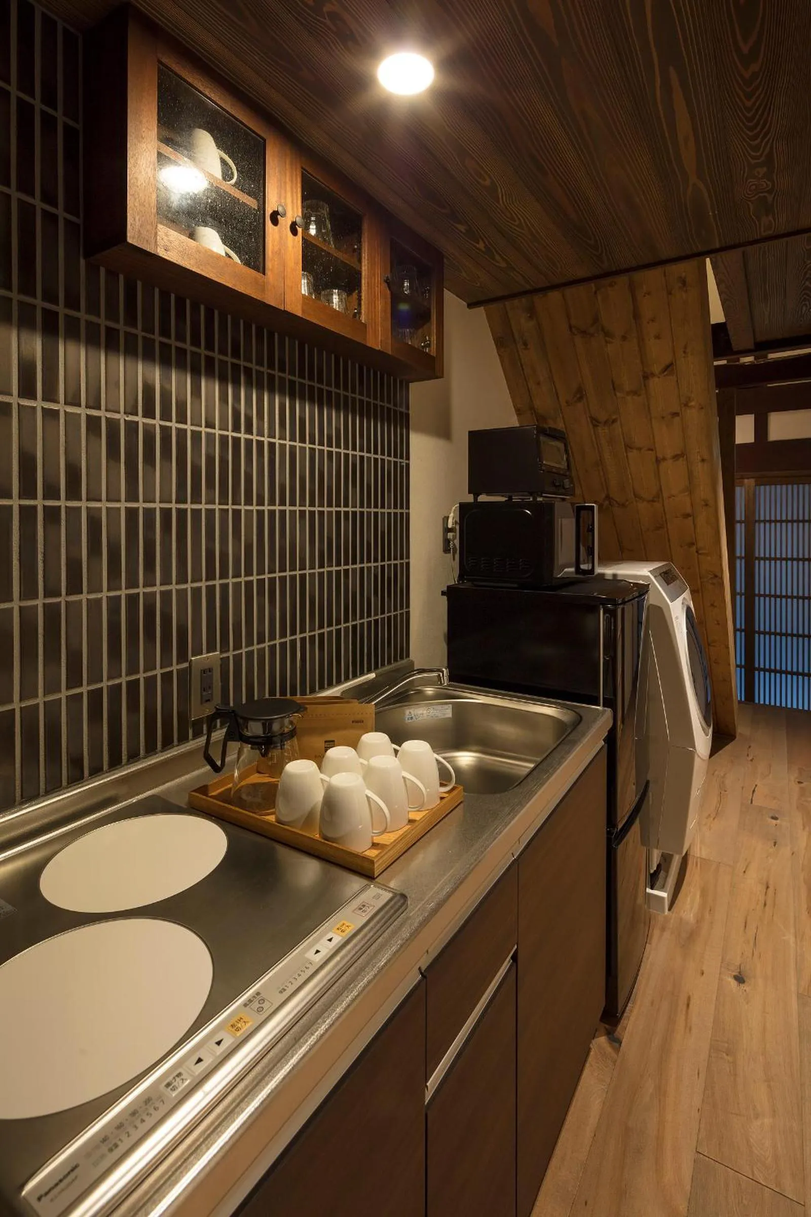 Kitchen or kitchenette in Sumitsugu Machiya House