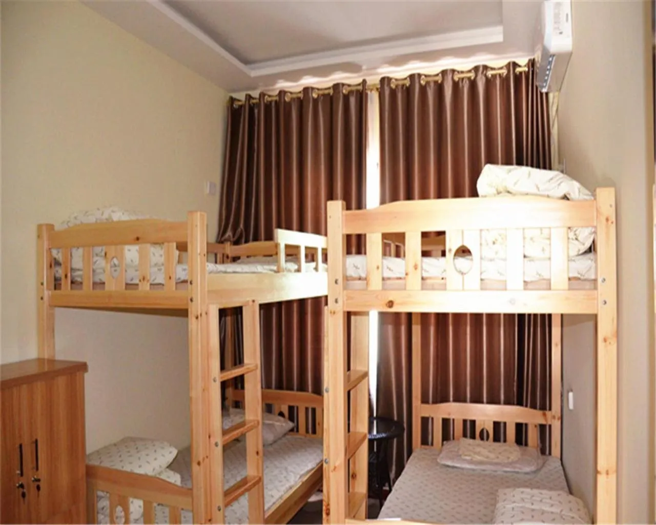 Bed in 4-Bed Female Dormitory Room - air conditioner in The Silk Road Travelers Hostel