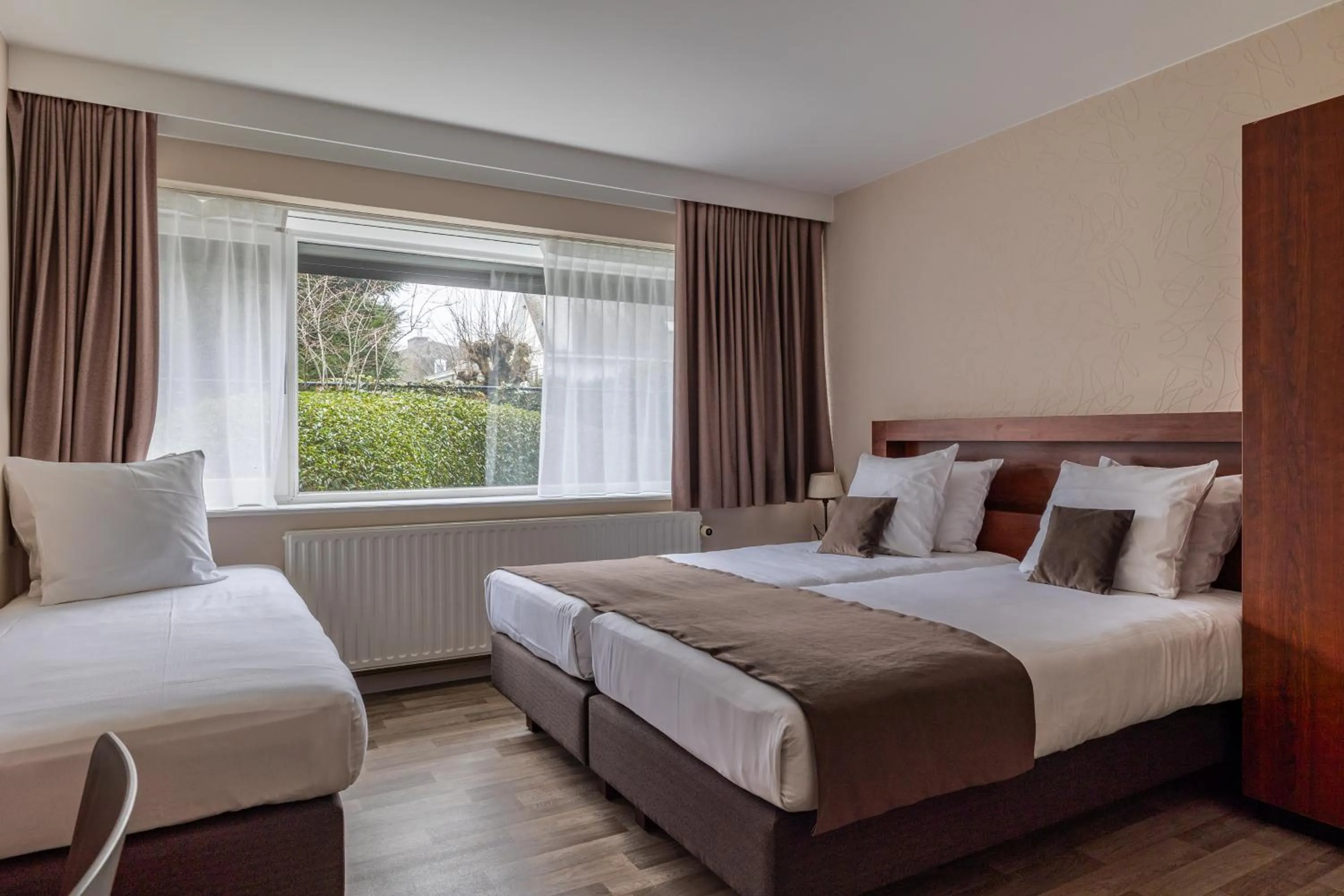 Bed in Hotel Olympia in Bruges