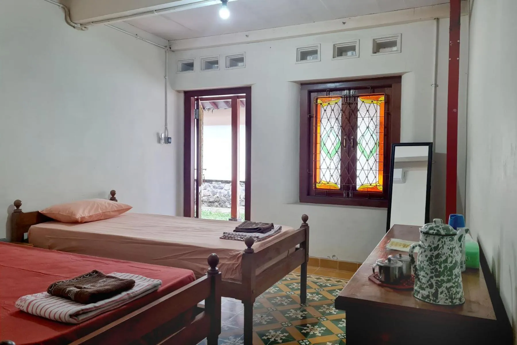 Bed in Omah Pitoe Yogya Homestay
