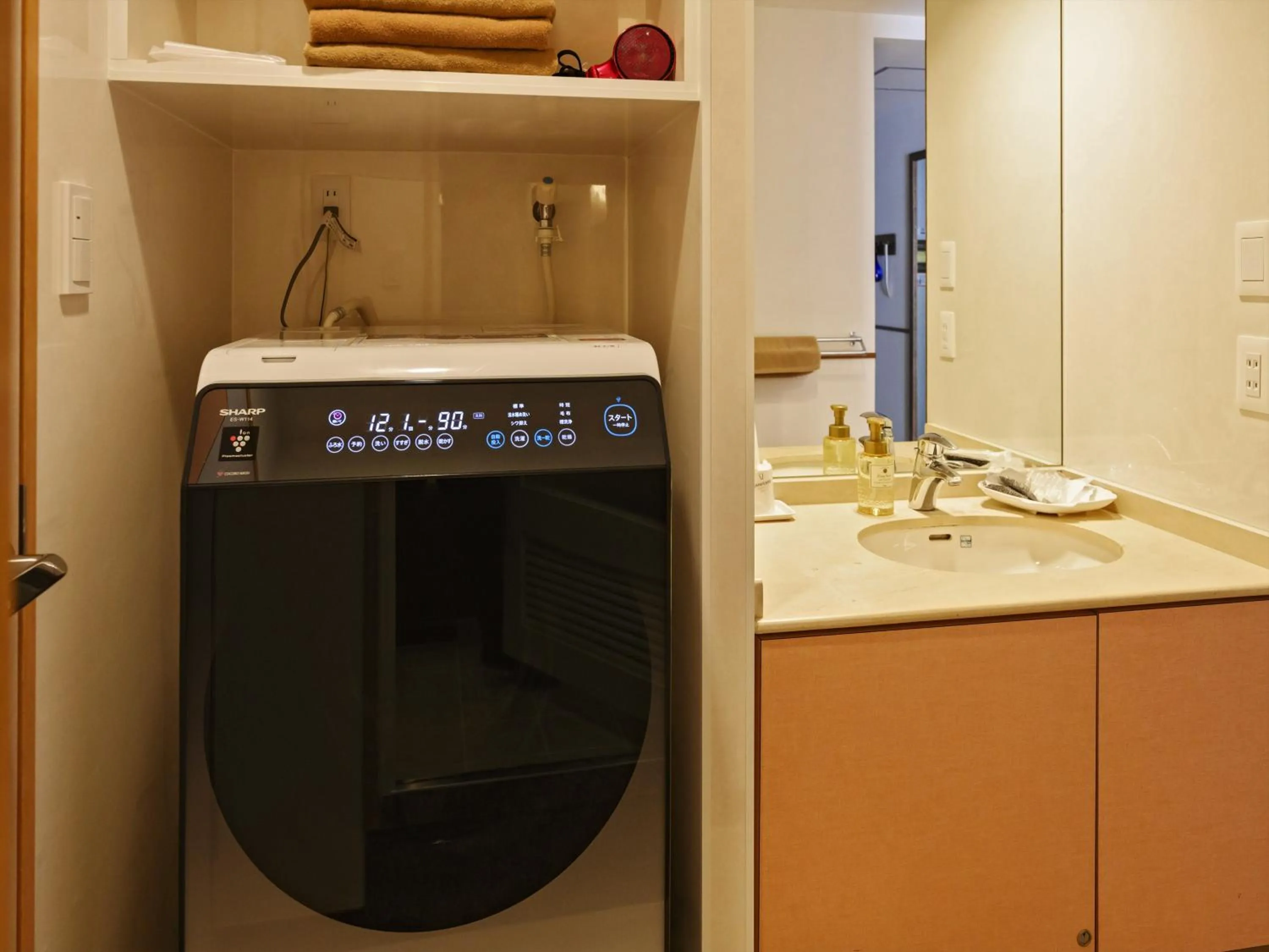 washing machine in Hotel Sunset Terrace