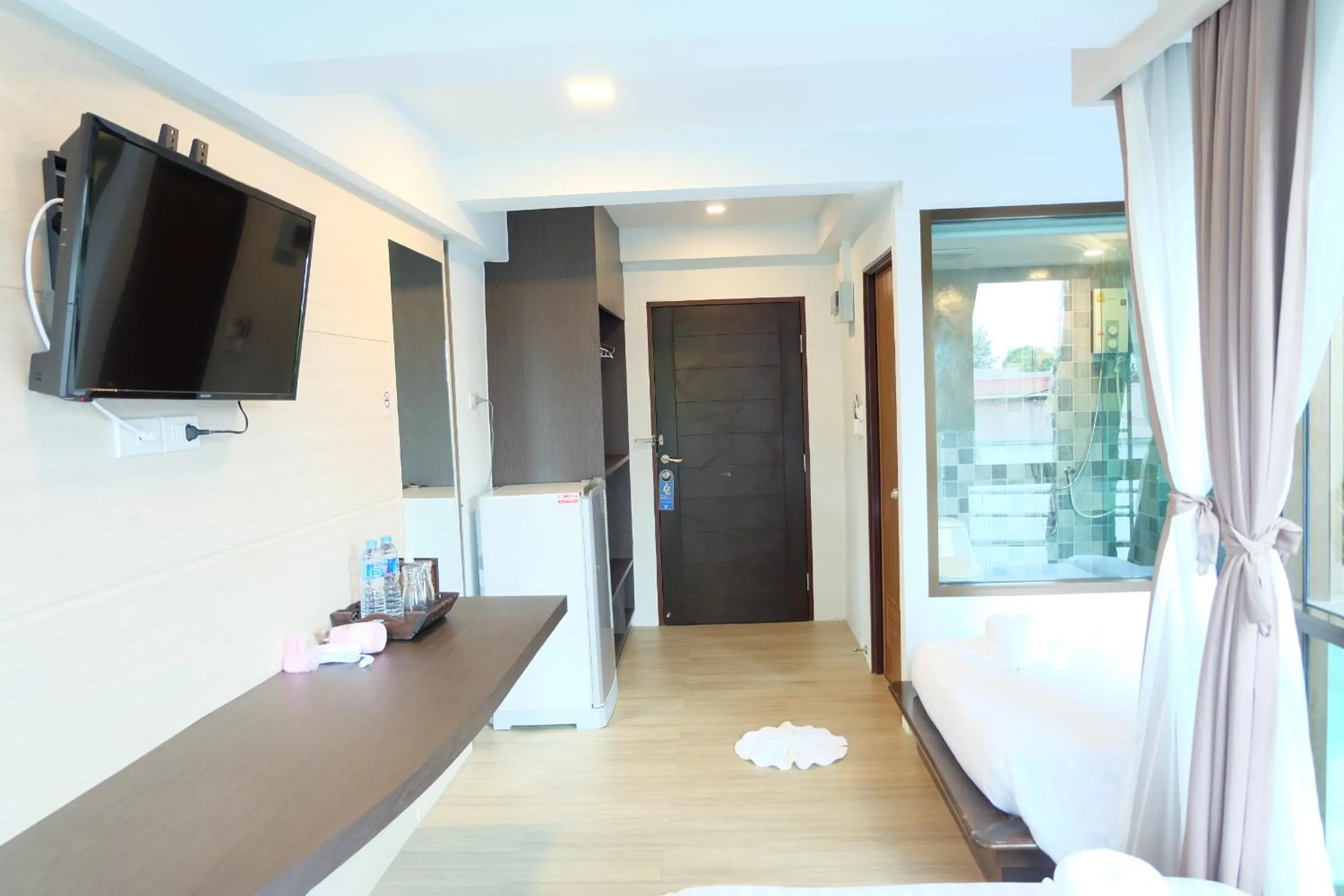 Photo of the whole room, Bed in A Plus Deluxe Hotel