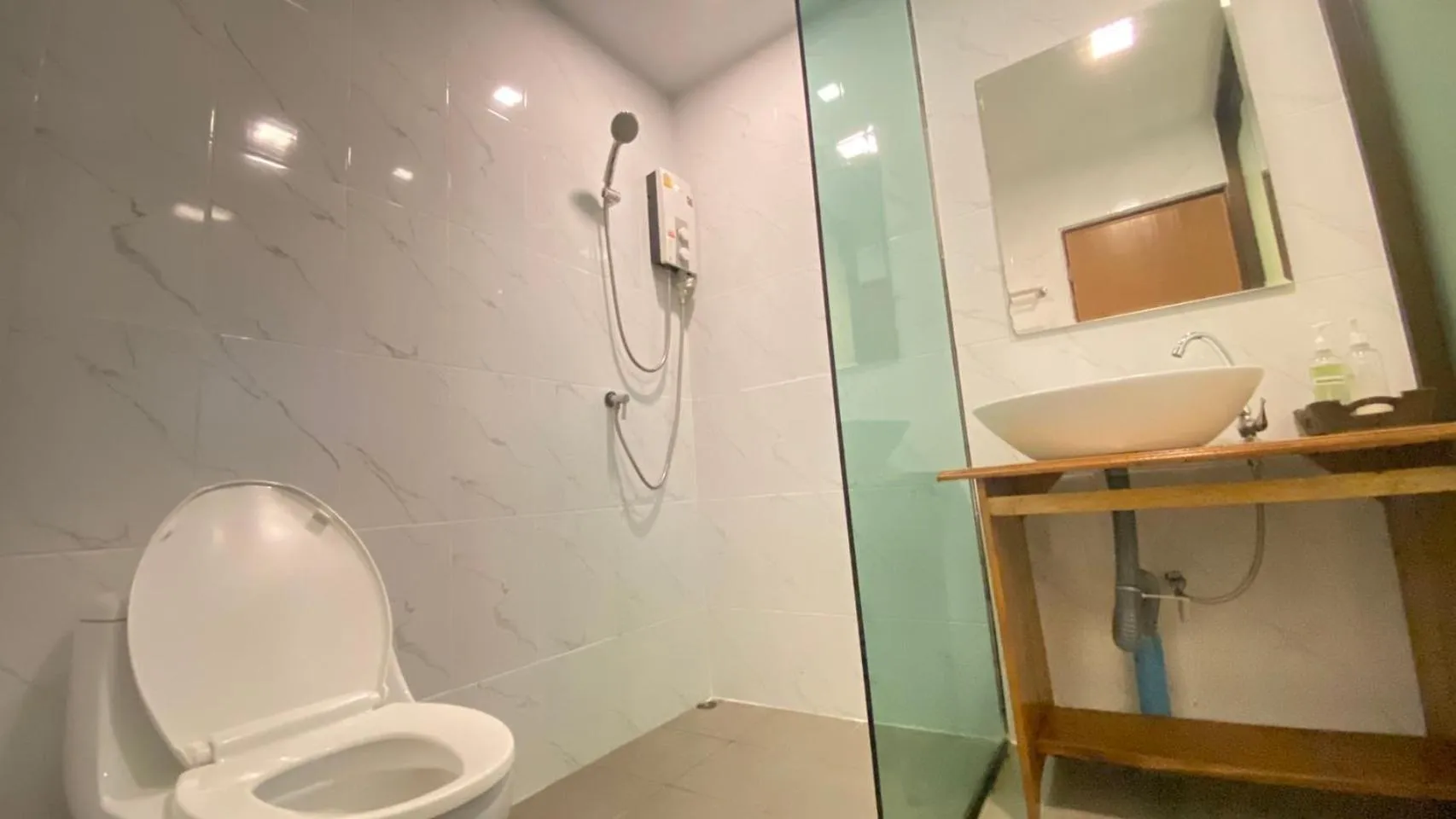 Shower in A Plus Deluxe Hotel