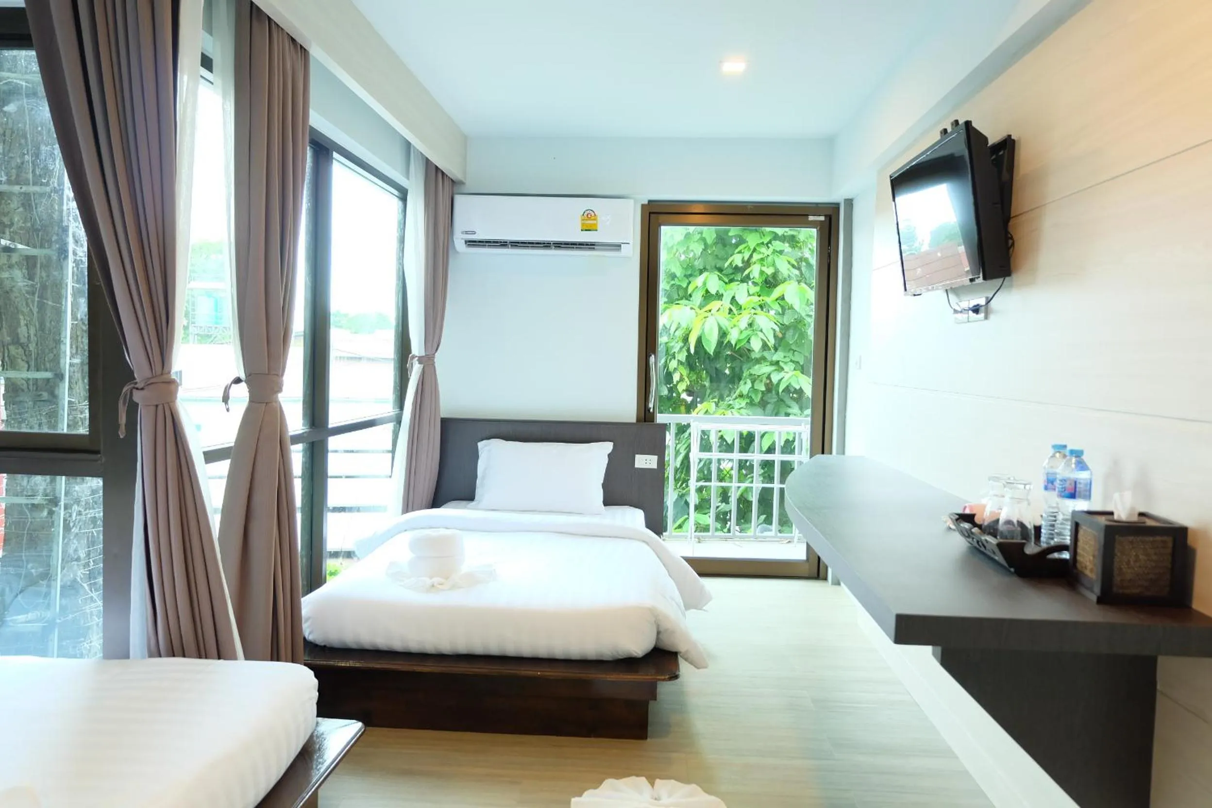 Photo of the whole room, Bed in A Plus Deluxe Hotel