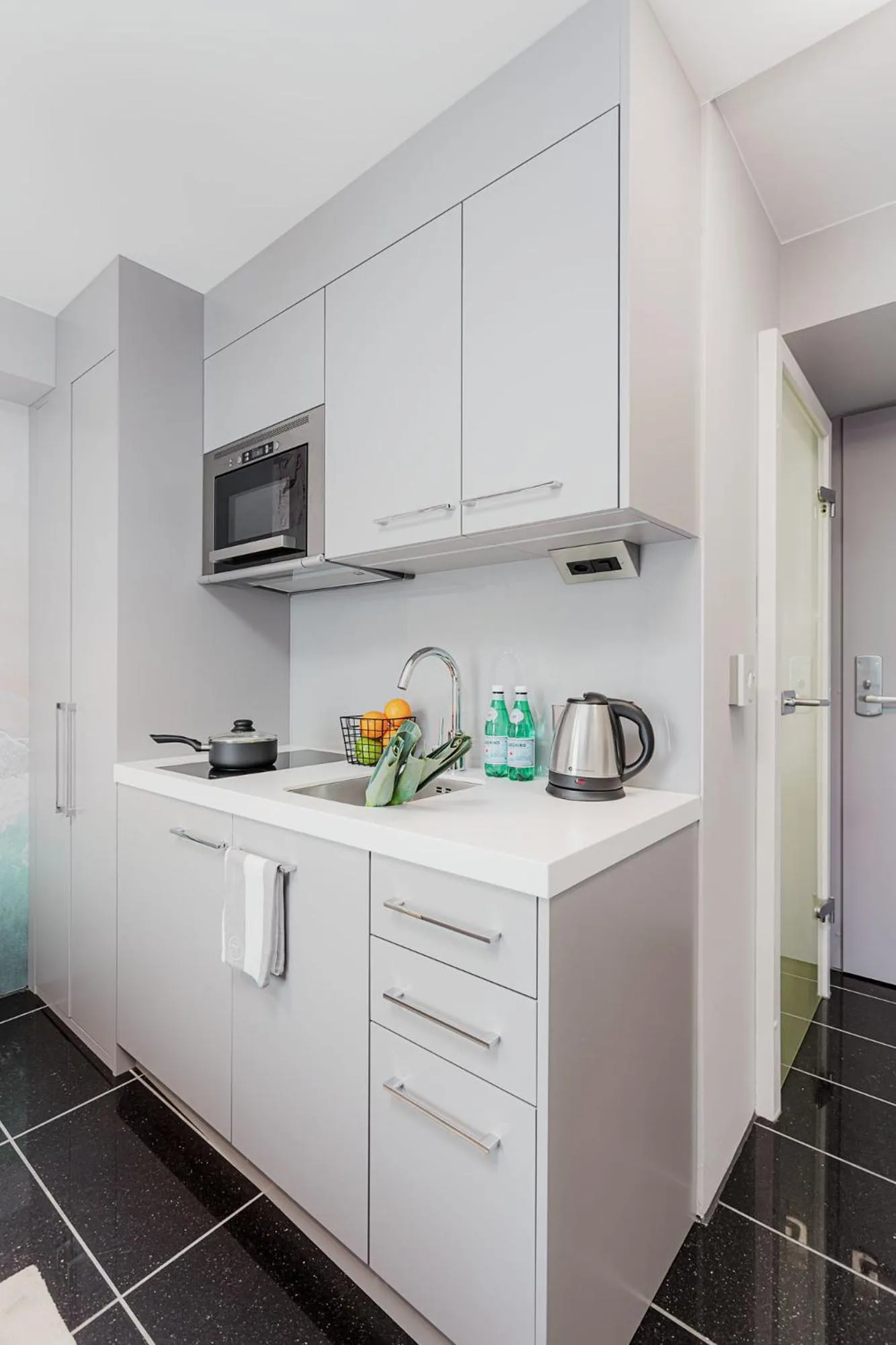 Kitchen or kitchenette in VISIONAPARTMENTS Lucerne - contactless check-in