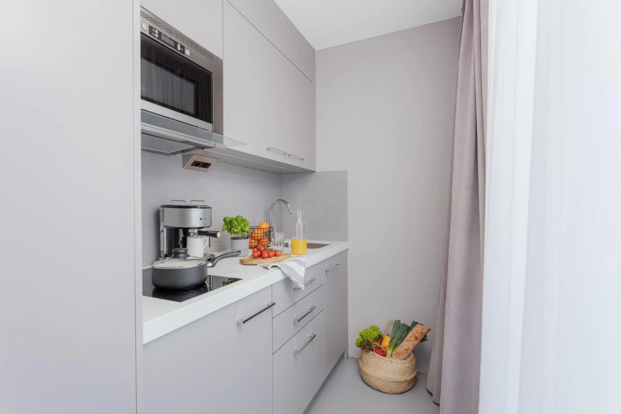 Kitchen or kitchenette in VISIONAPARTMENTS Lucerne - contactless check-in