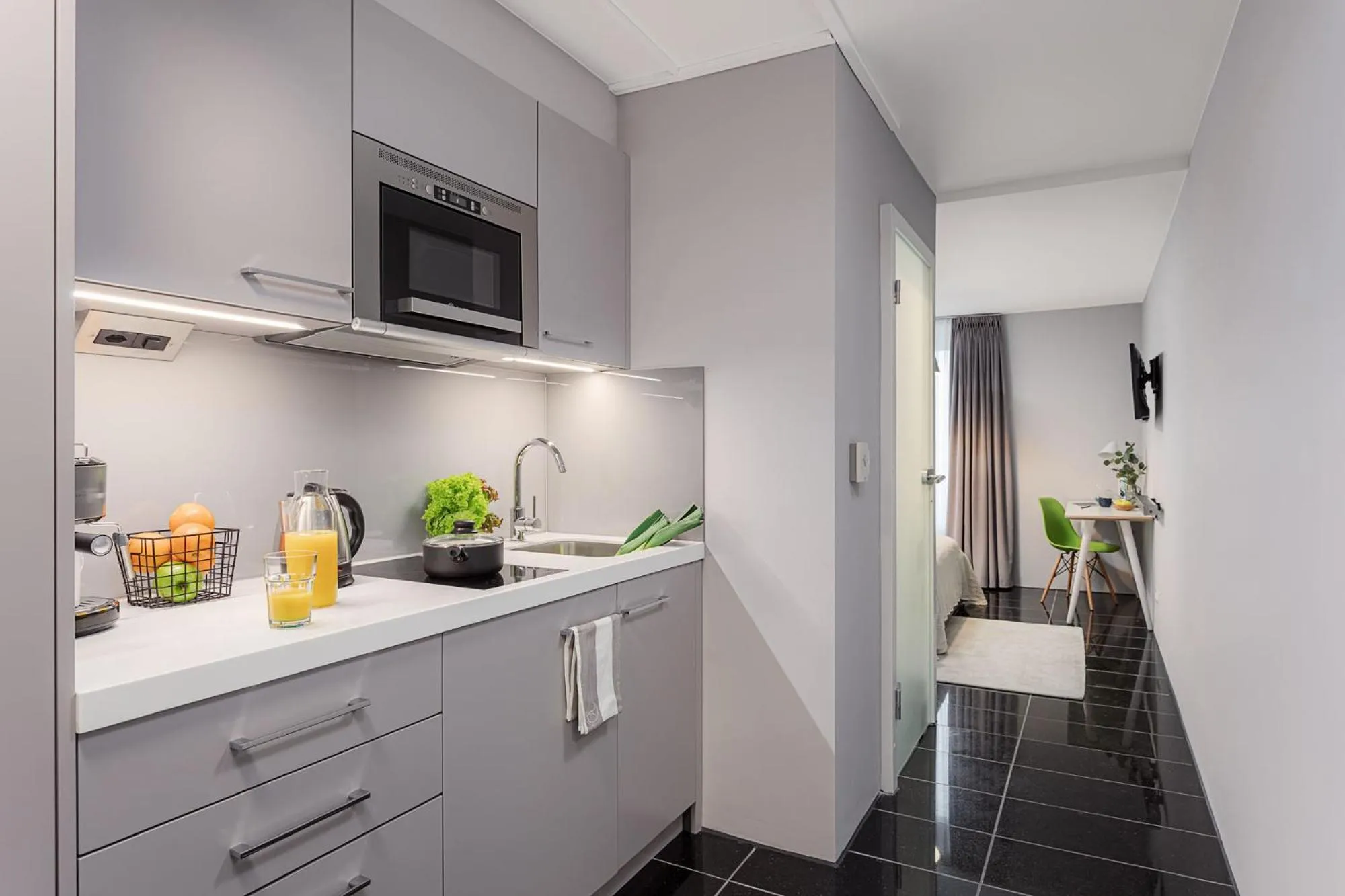 Kitchen or kitchenette in VISIONAPARTMENTS Lucerne - contactless check-in
